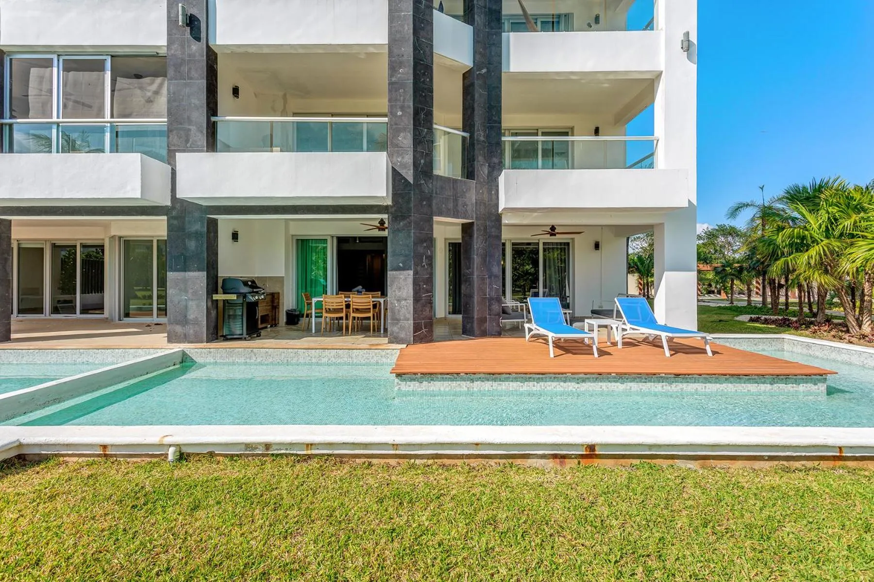 Property building in Luxury Condos at Mareazul Beachfront Complex with Resort-Style Amenities