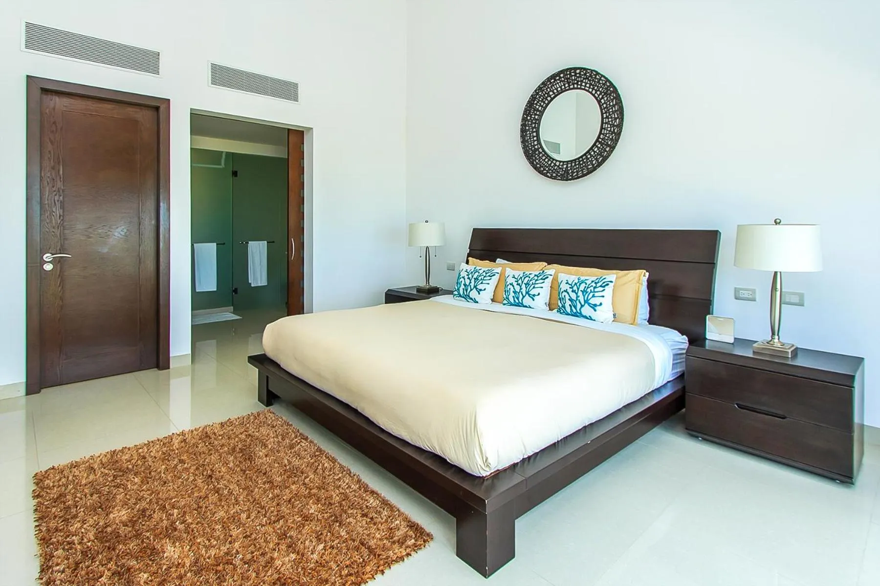 Bed in Luxury Condos at Mareazul Beachfront Complex with Resort-Style Amenities