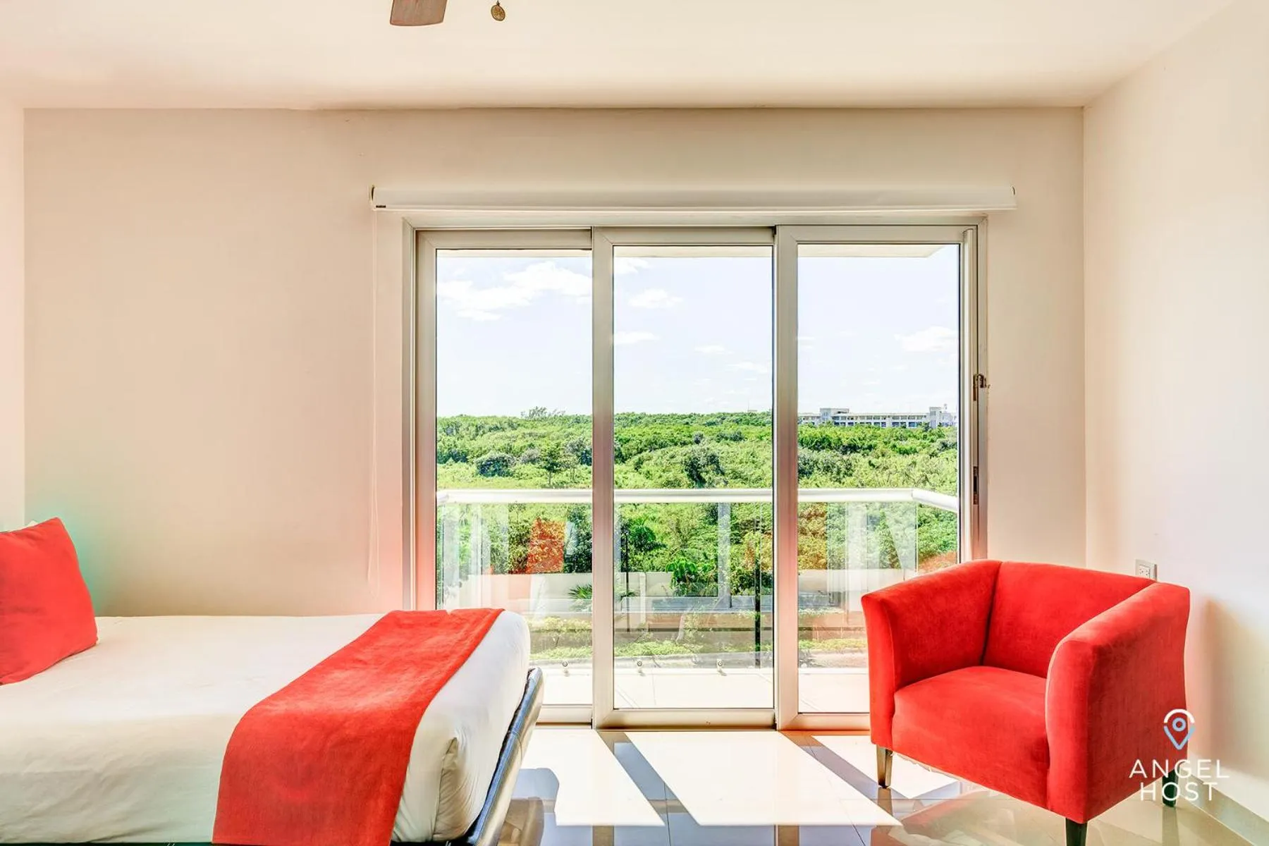 Bed in Luxury Condos at Mareazul Beachfront Complex with Resort-Style Amenities