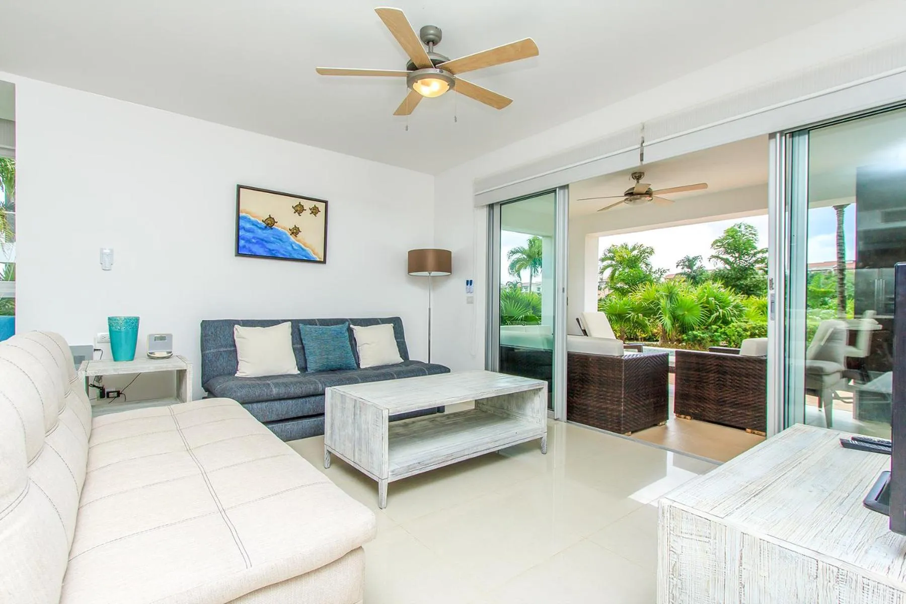 Living room in Luxury Condos at Mareazul Beachfront Complex with Resort-Style Amenities