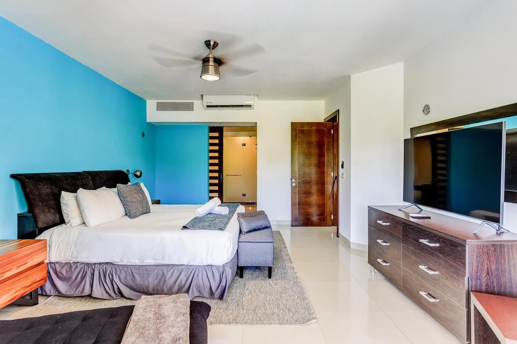 Bed in Luxury Condos at Mareazul Beachfront Complex with Resort-Style Amenities