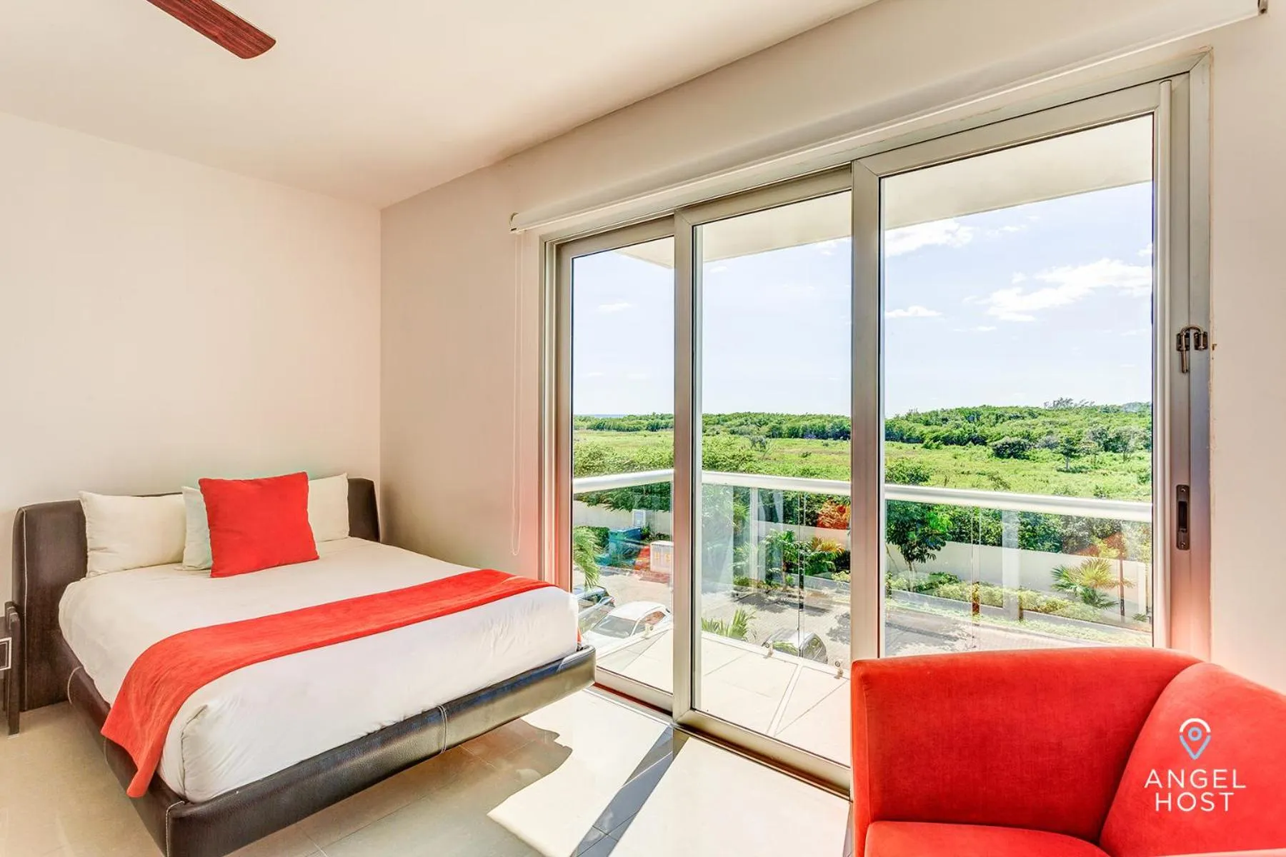 Bed in Luxury Condos at Mareazul Beachfront Complex with Resort-Style Amenities