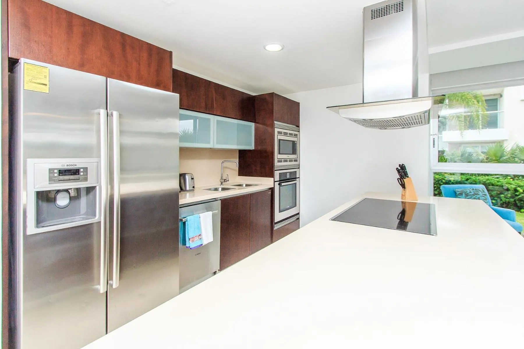Kitchen or kitchenette in Luxury Condos at Mareazul Beachfront Complex with Resort-Style Amenities