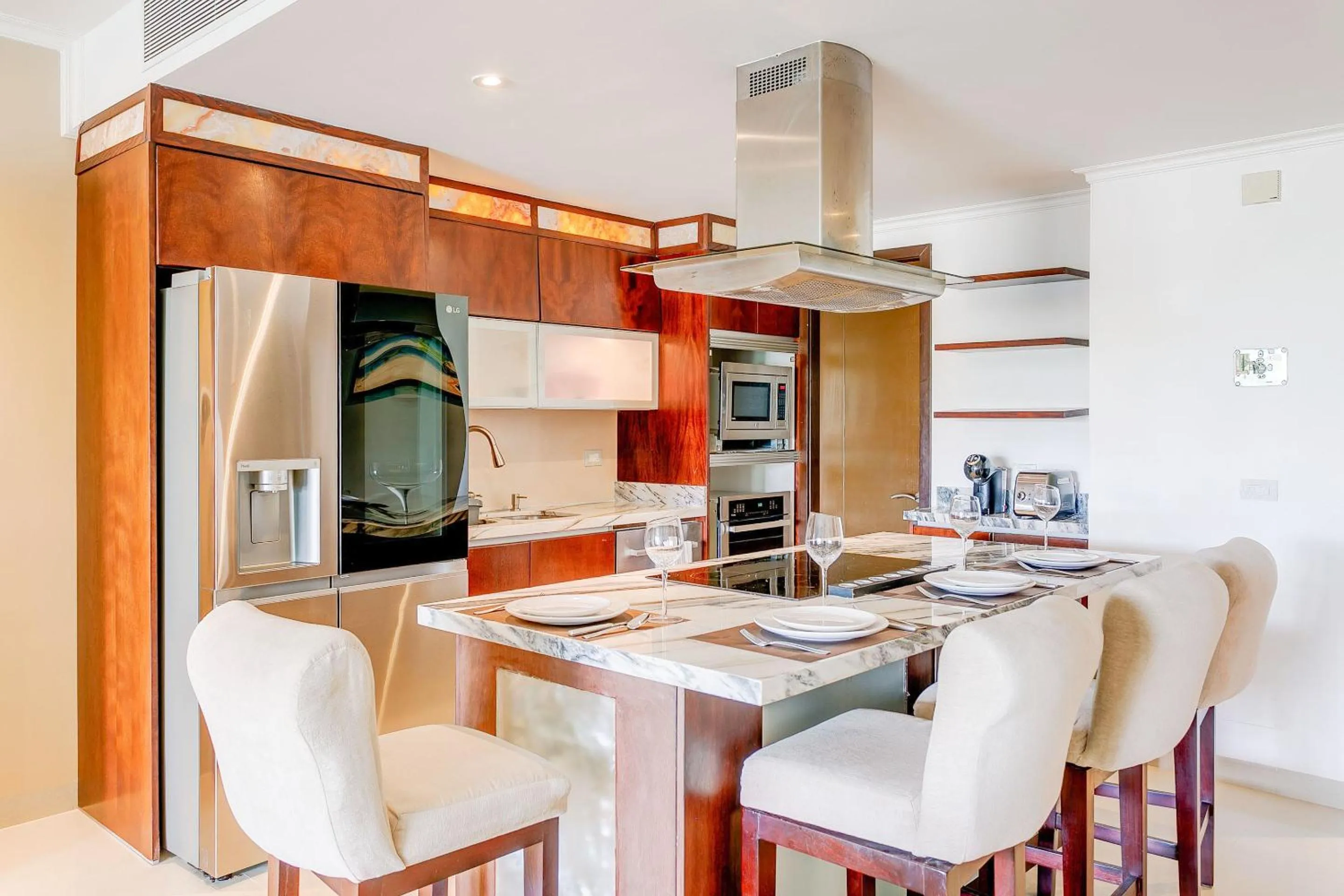 Kitchen or kitchenette in Luxury Condos at Mareazul Beachfront Complex with Resort-Style Amenities