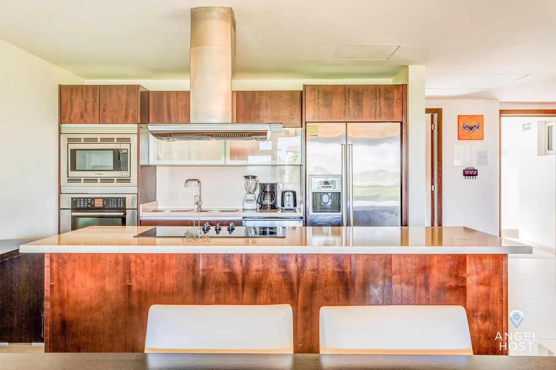 Kitchen or kitchenette in Luxury Condos at Mareazul Beachfront Complex with Resort-Style Amenities