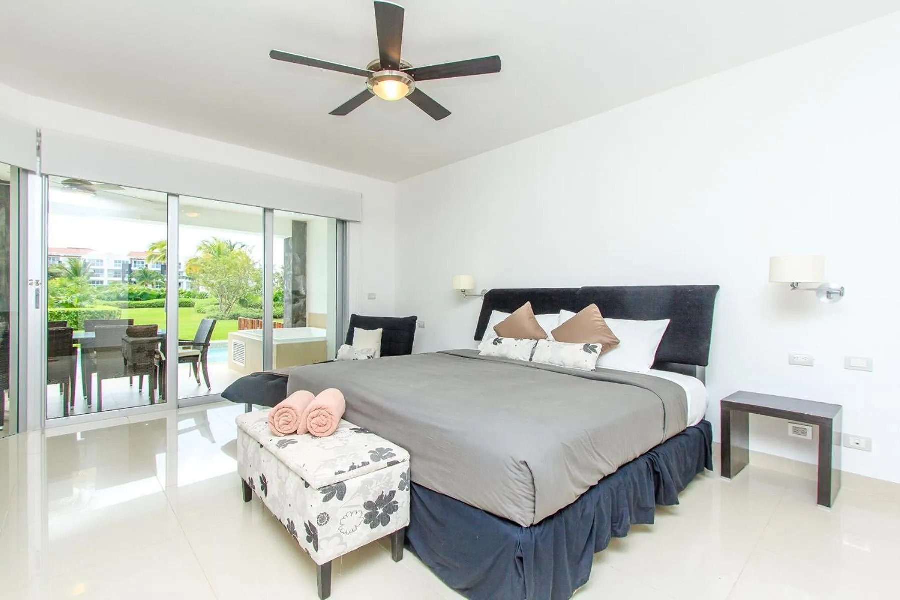 Bed in Luxury Condos at Mareazul Beachfront Complex with Resort-Style Amenities