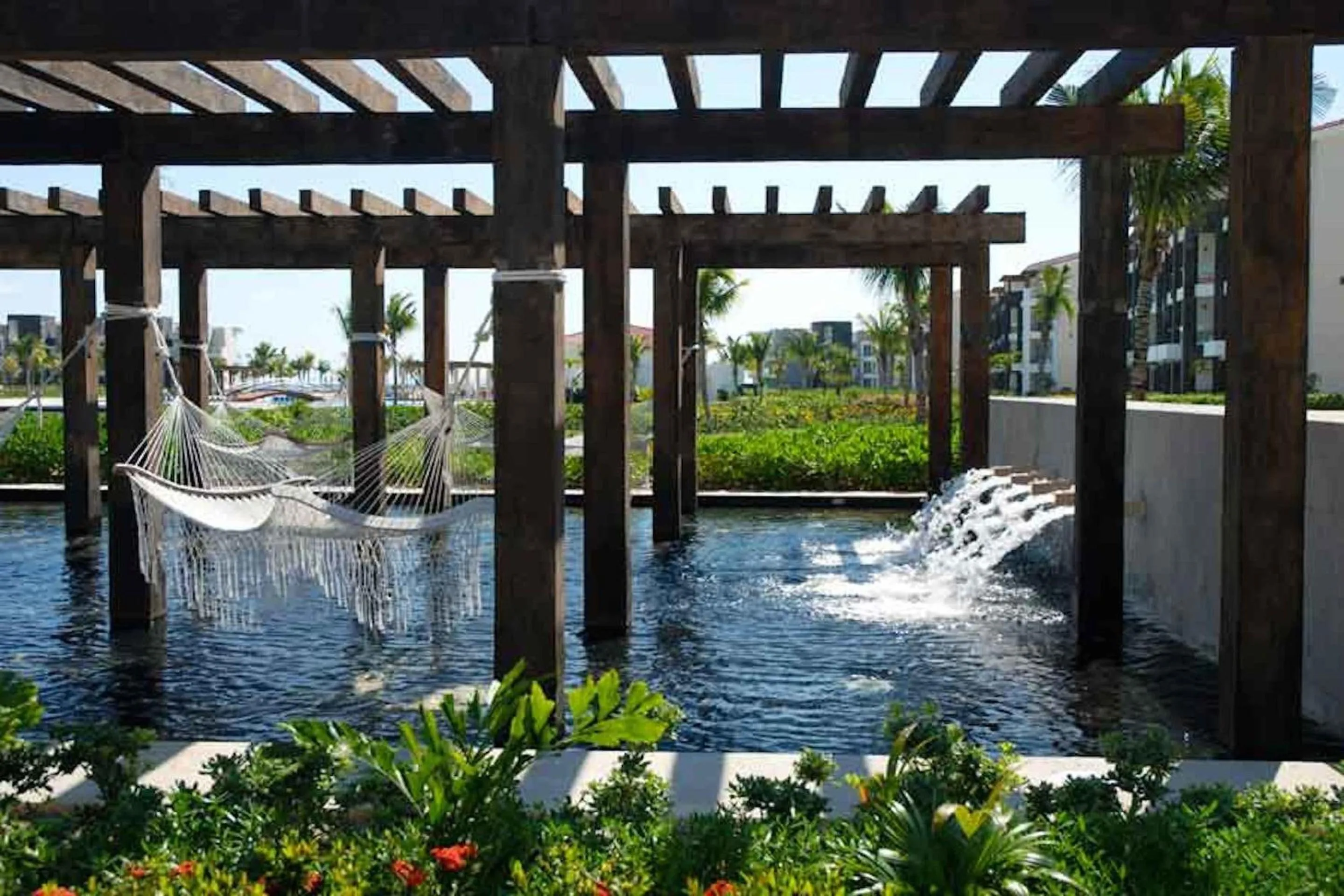 Garden in Luxury Condos at Mareazul Beachfront Complex with Resort-Style Amenities