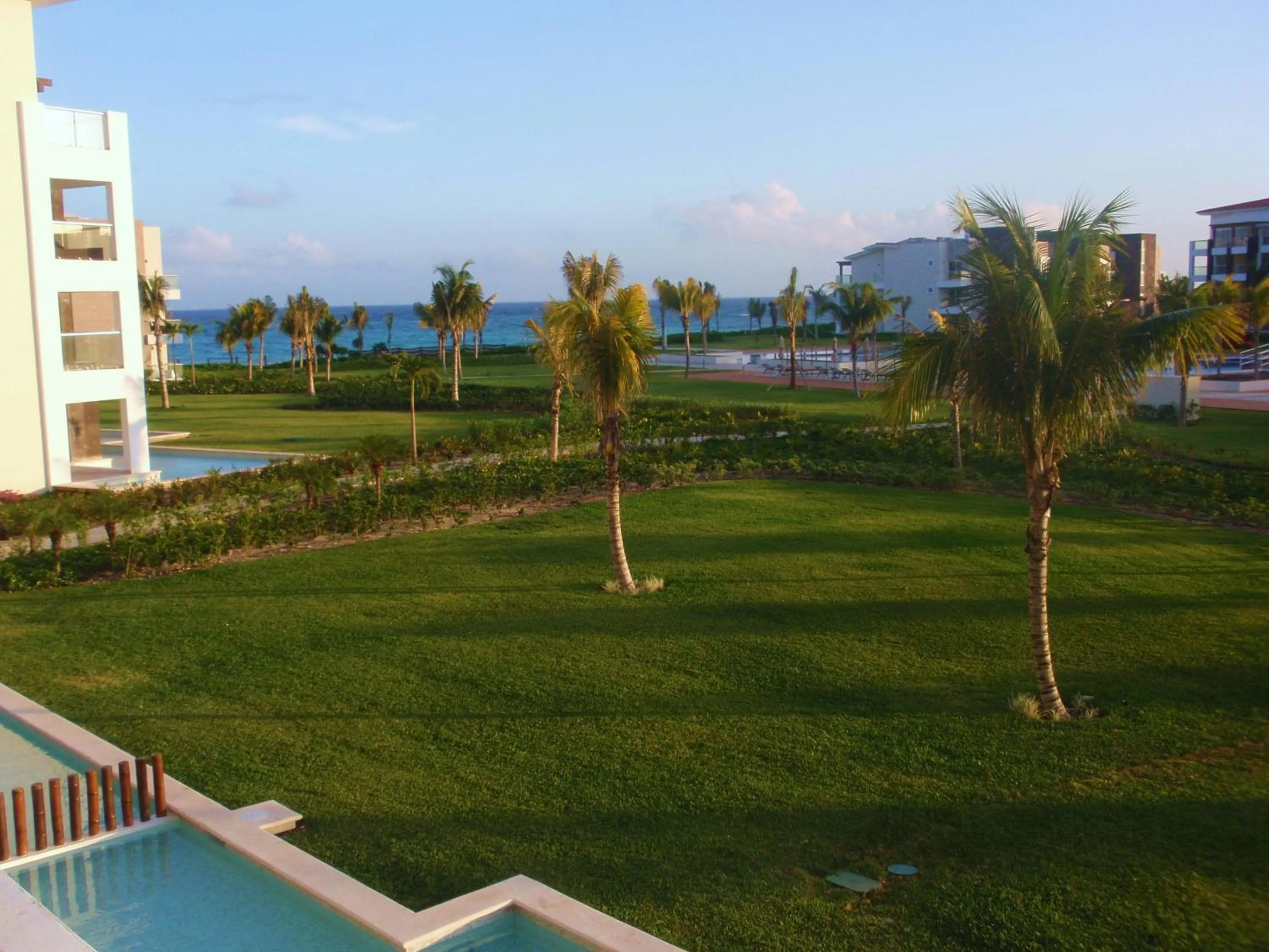 Garden in Luxury Condos at Mareazul Beachfront Complex with Resort-Style Amenities