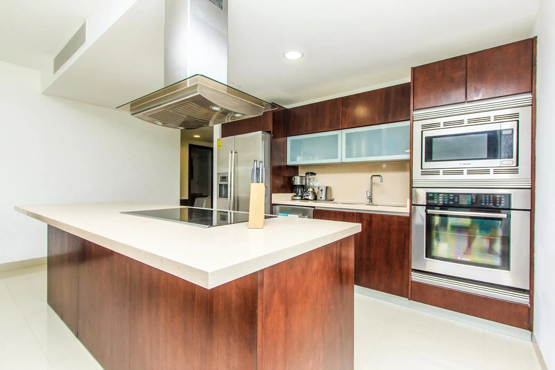 Kitchen or kitchenette in Luxury Condos at Mareazul Beachfront Complex with Resort-Style Amenities