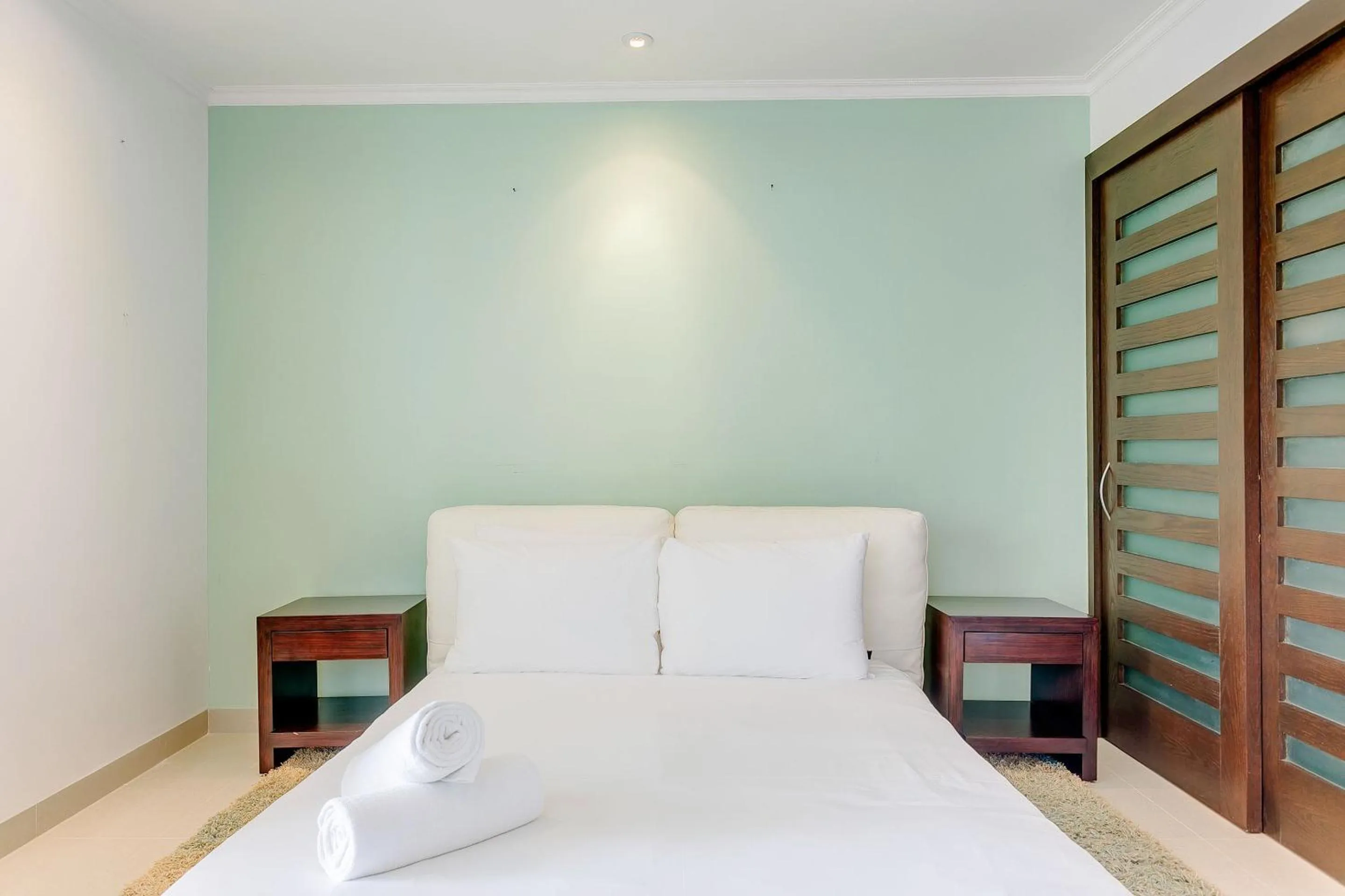 Bed in Luxury Condos at Mareazul Beachfront Complex with Resort-Style Amenities