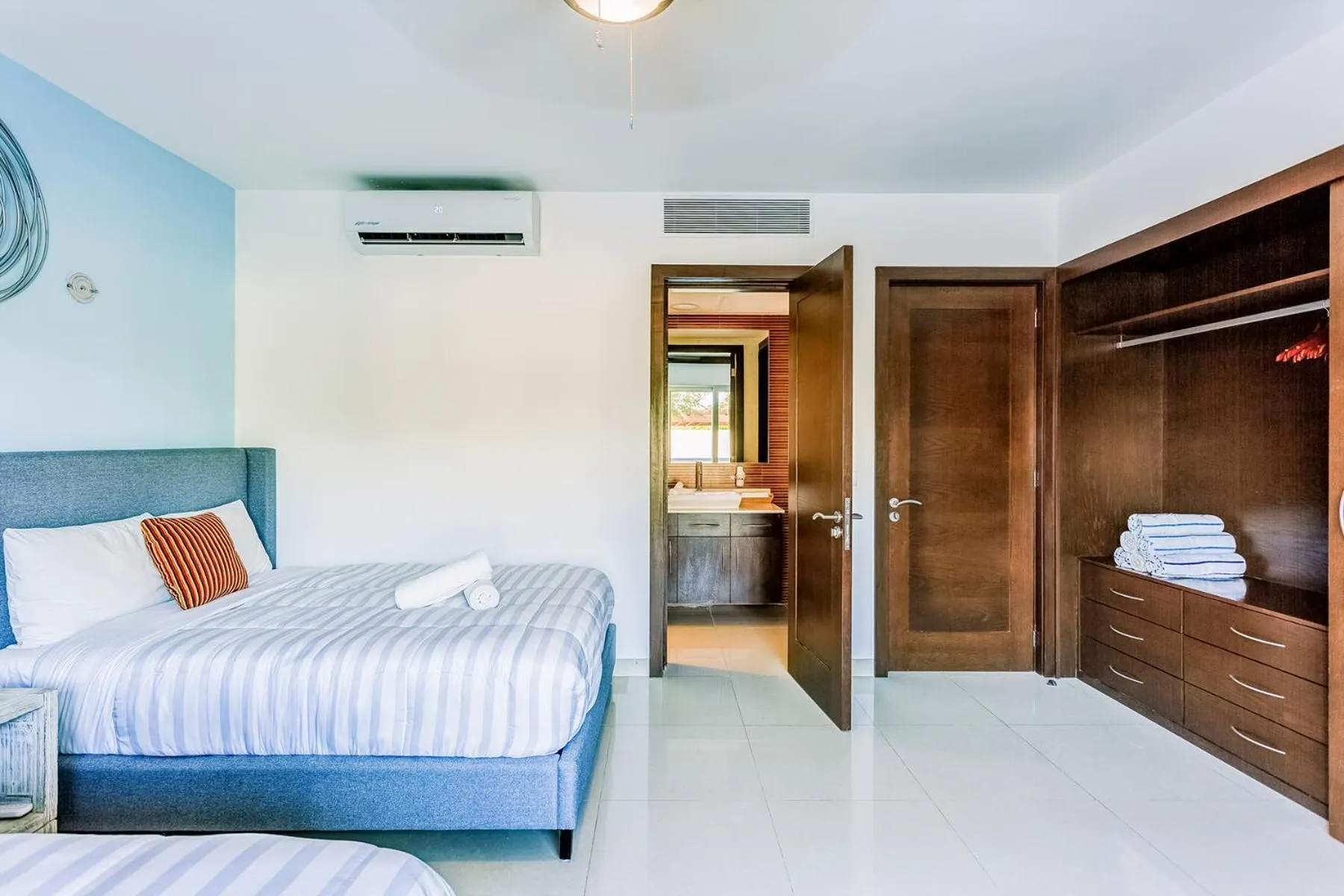 Bed in Luxury Condos at Mareazul Beachfront Complex with Resort-Style Amenities