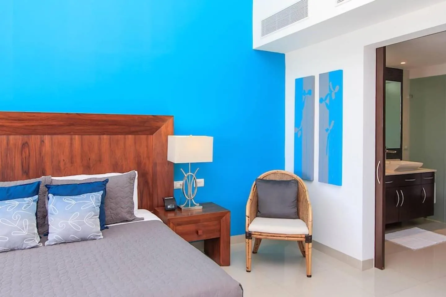 Bed in Luxury Condos at Mareazul Beachfront Complex with Resort-Style Amenities