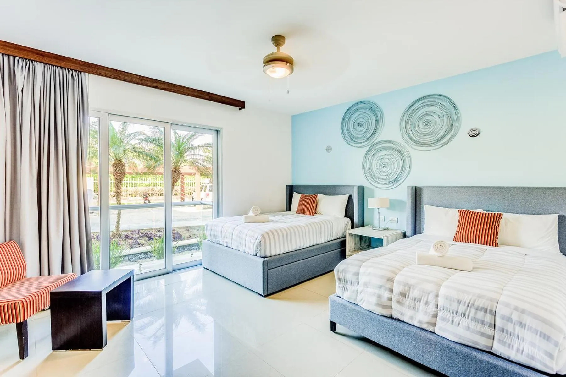 Bed in Luxury Condos at Mareazul Beachfront Complex with Resort-Style Amenities