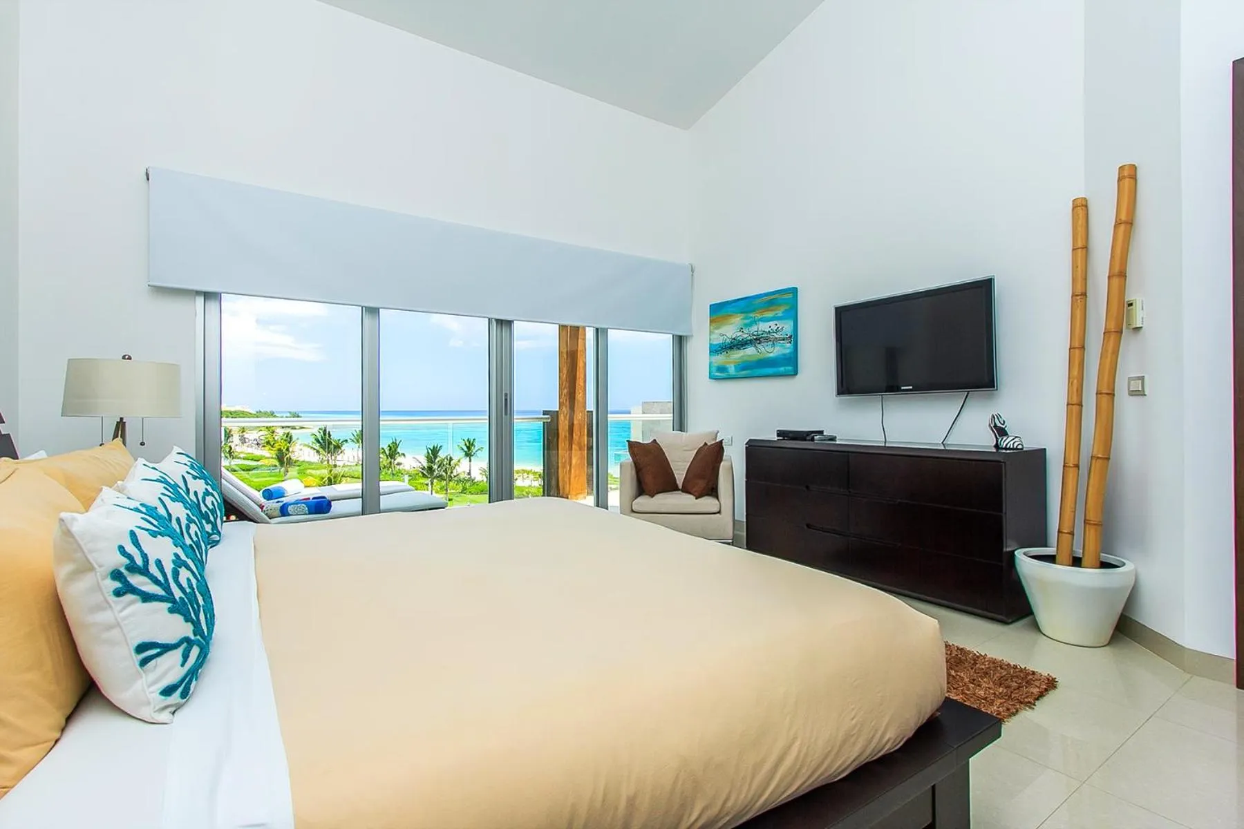 Bed in Luxury Condos at Mareazul Beachfront Complex with Resort-Style Amenities