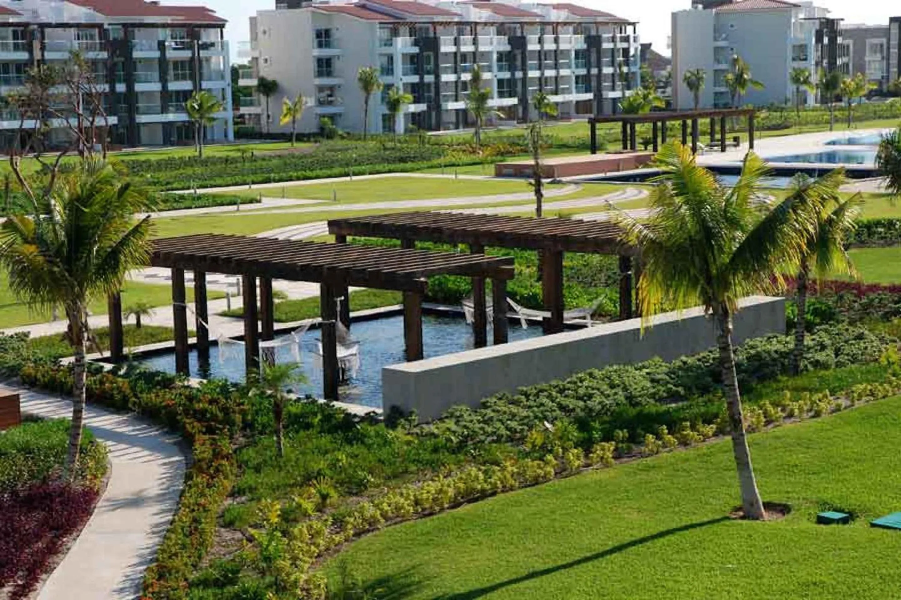 Garden in Luxury Condos at Mareazul Beachfront Complex with Resort-Style Amenities