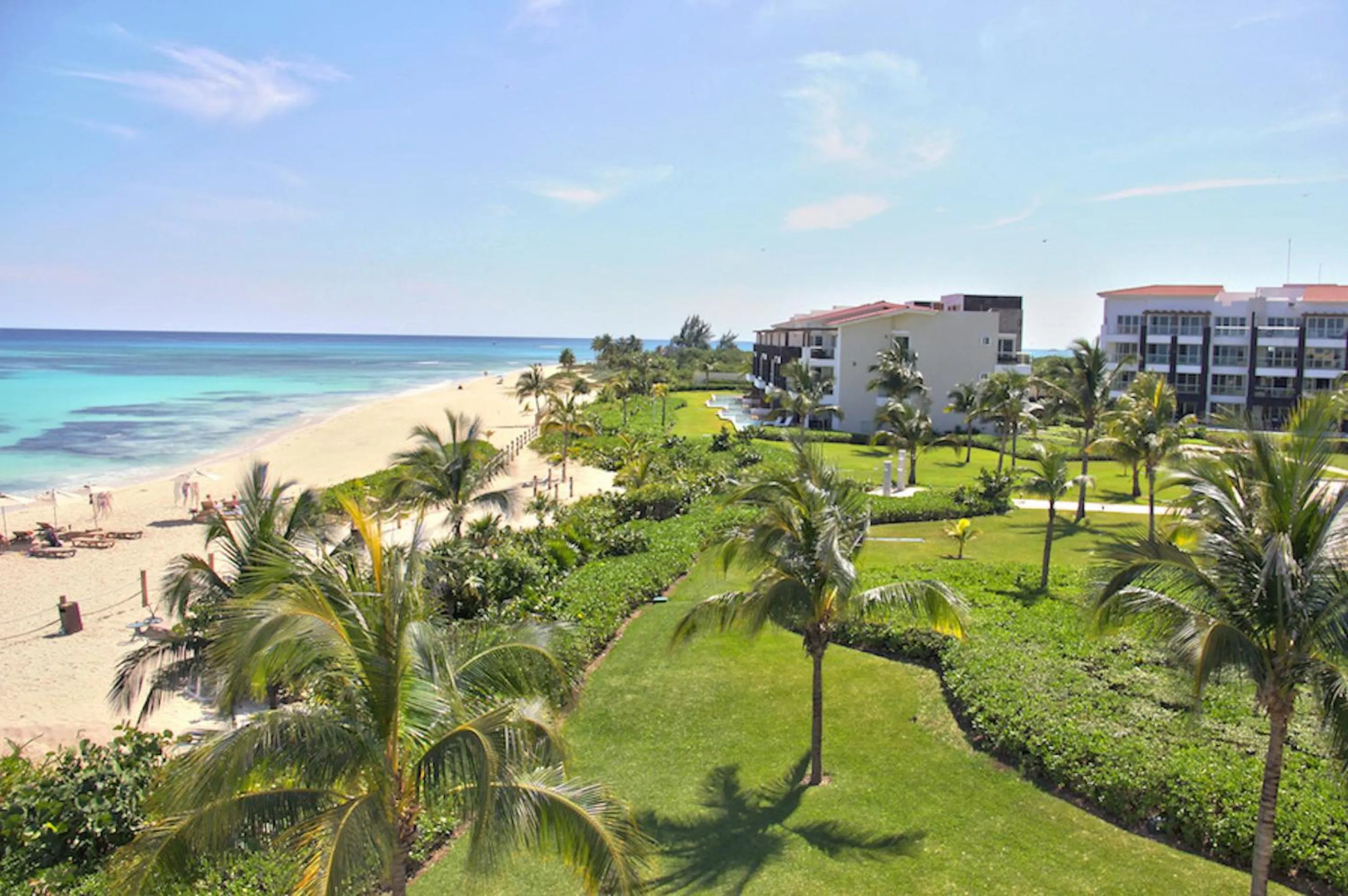 Garden in Luxury Condos at Mareazul Beachfront Complex with Resort-Style Amenities