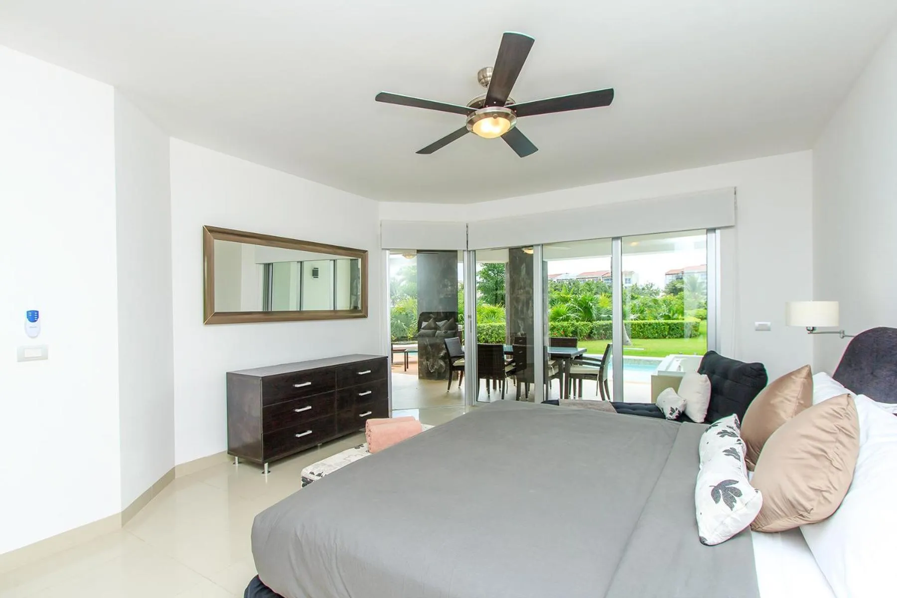 Bed in Luxury Condos at Mareazul Beachfront Complex with Resort-Style Amenities