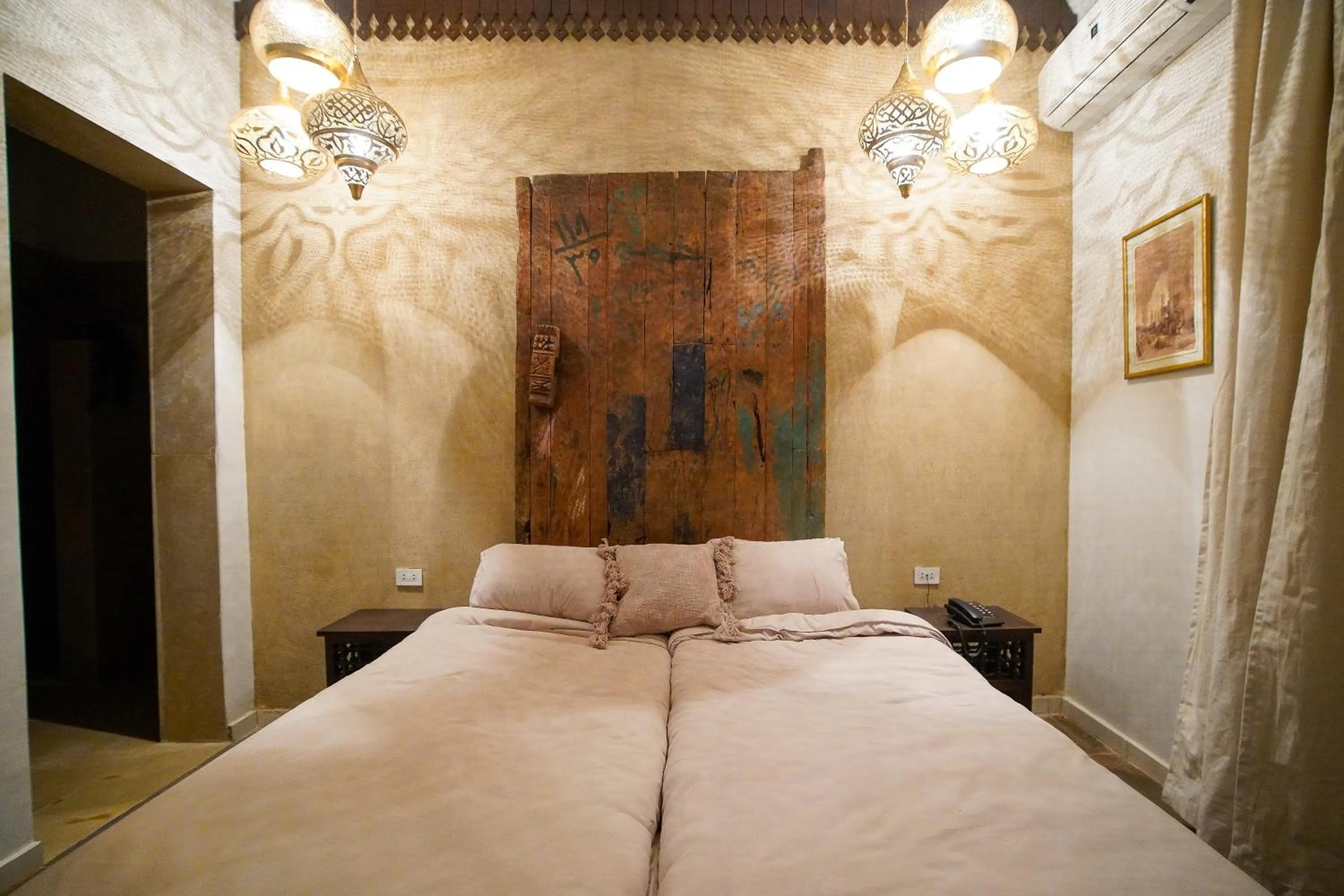 Bed in Al Wadi Boutique Hotel