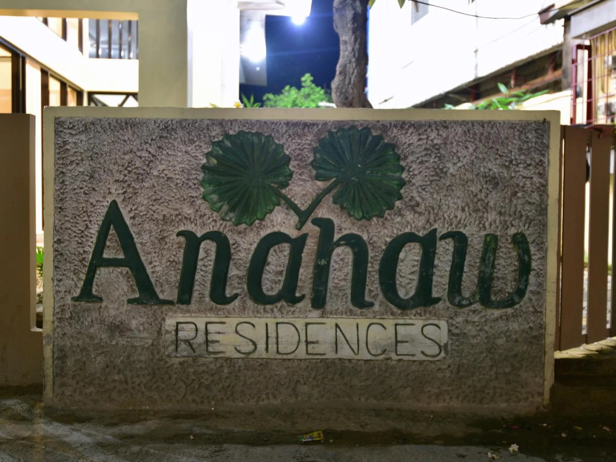 Property logo or sign in Anahaw Apartments Whitebeach