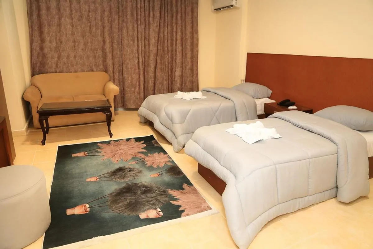 Living room in Verssailles Pyramids Hotel