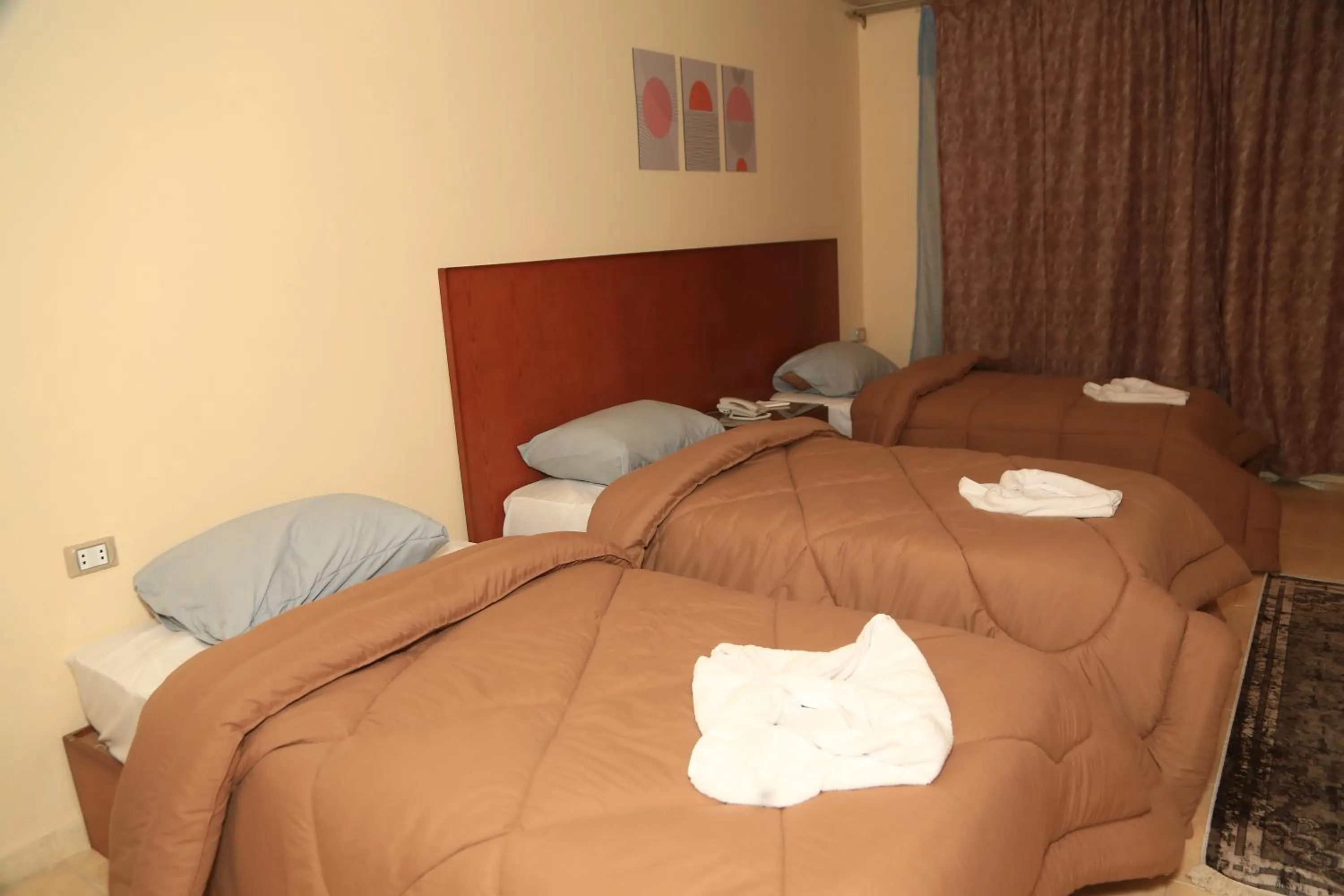 Bedroom in Verssailles Pyramids Hotel