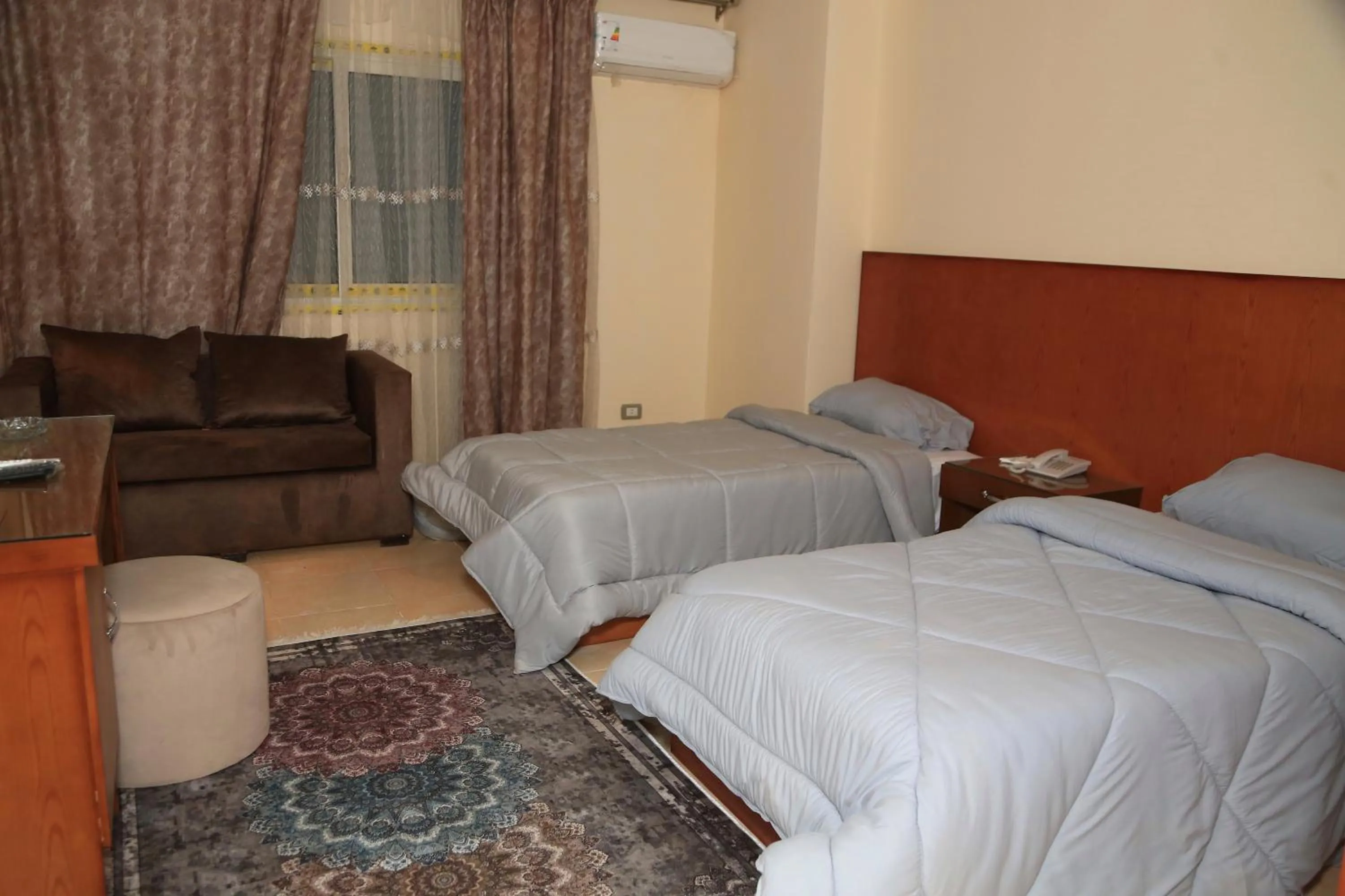 Bedroom in Verssailles Pyramids Hotel