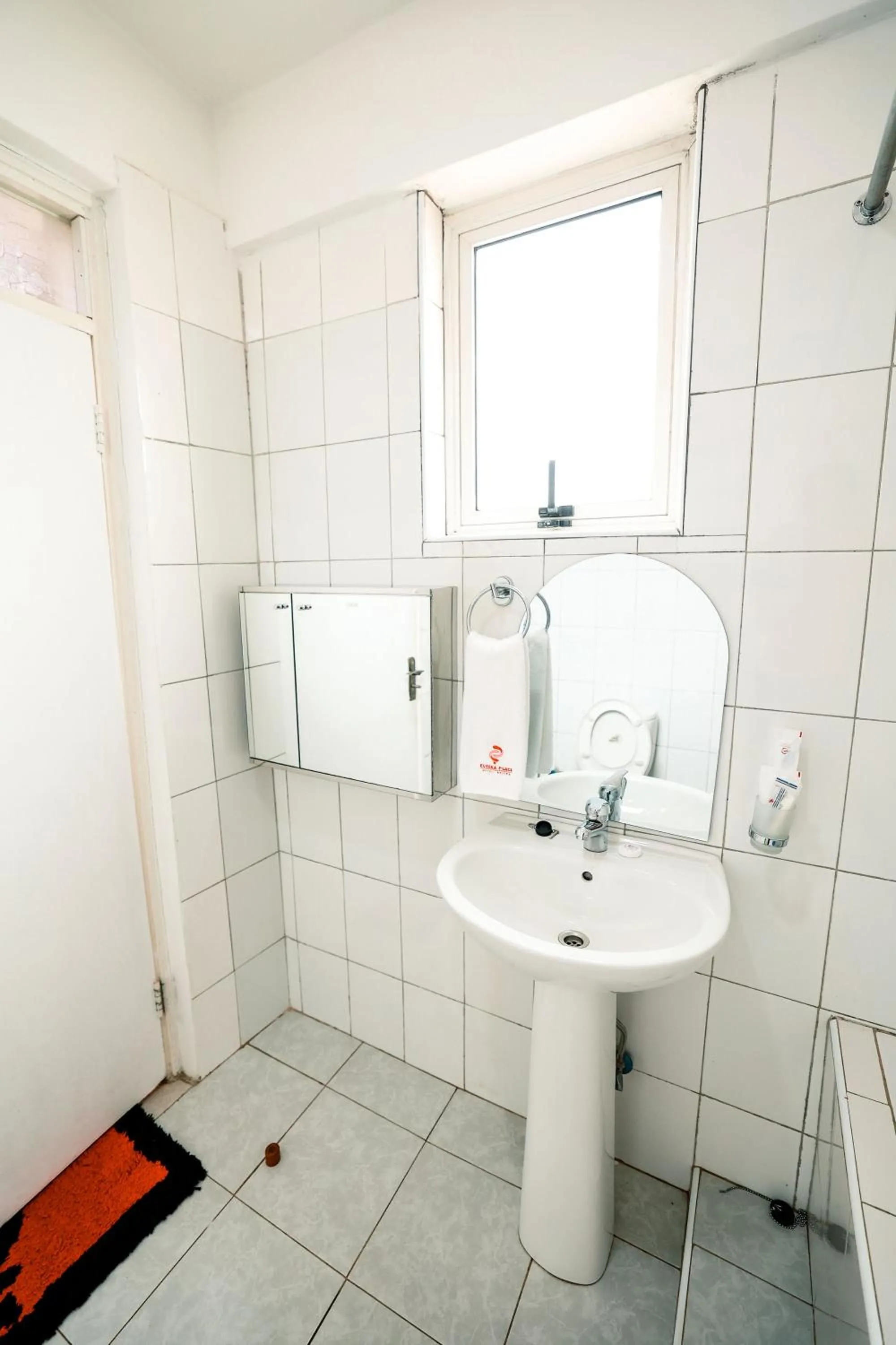 Toilet in Eureka Place Hotel Kampala