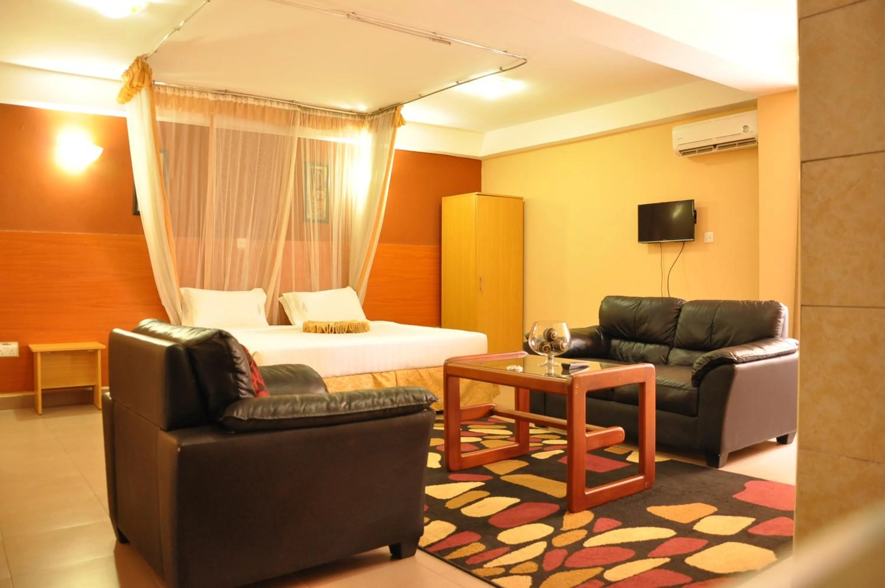 TV and multimedia, Bed in Eureka Place Hotel Kampala