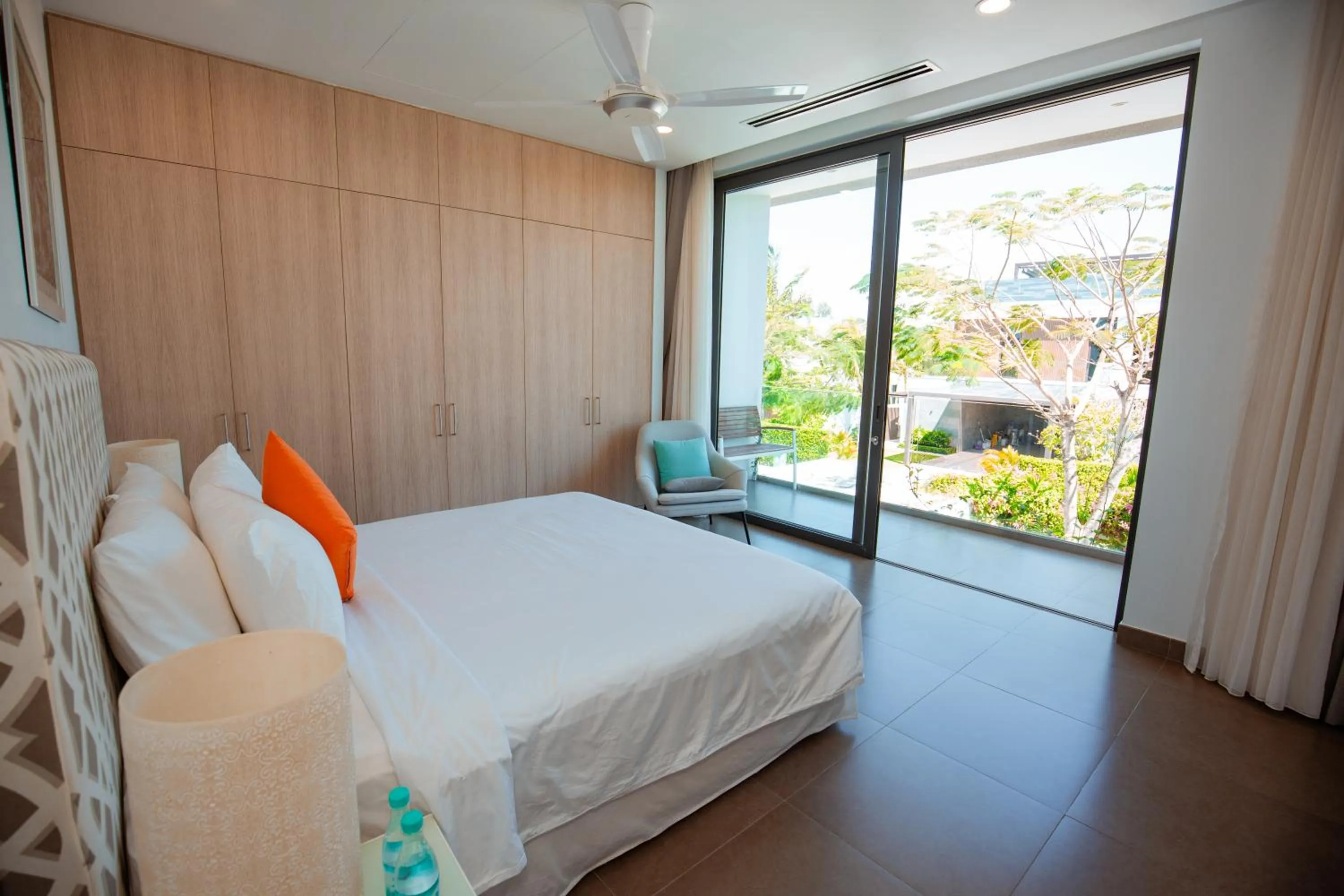 Bed in Beachfront 4 Bedrooms private pool villa Sanctuary Ho Tram resort
