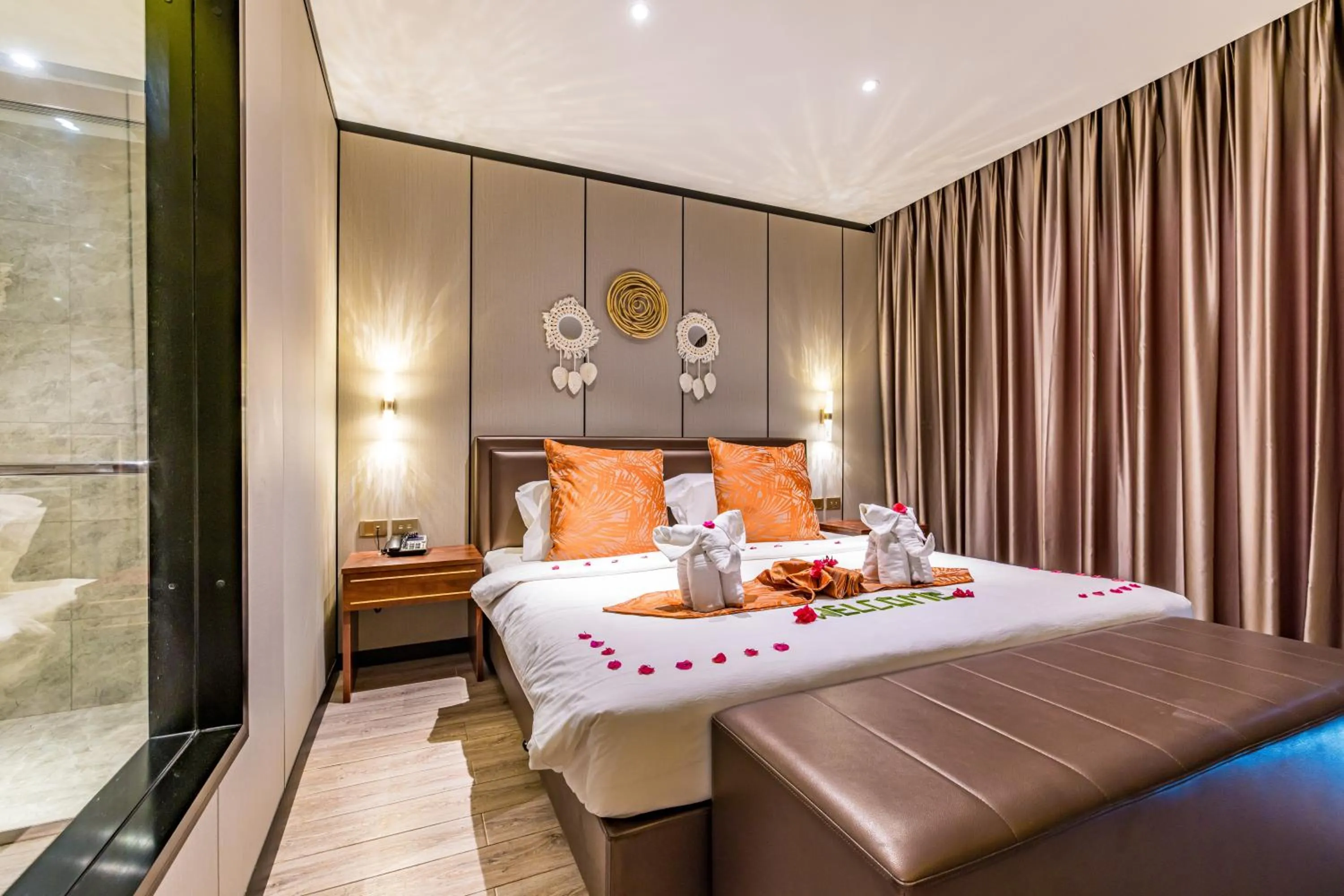 Bed in BJ & Radisson Sea View Hotel