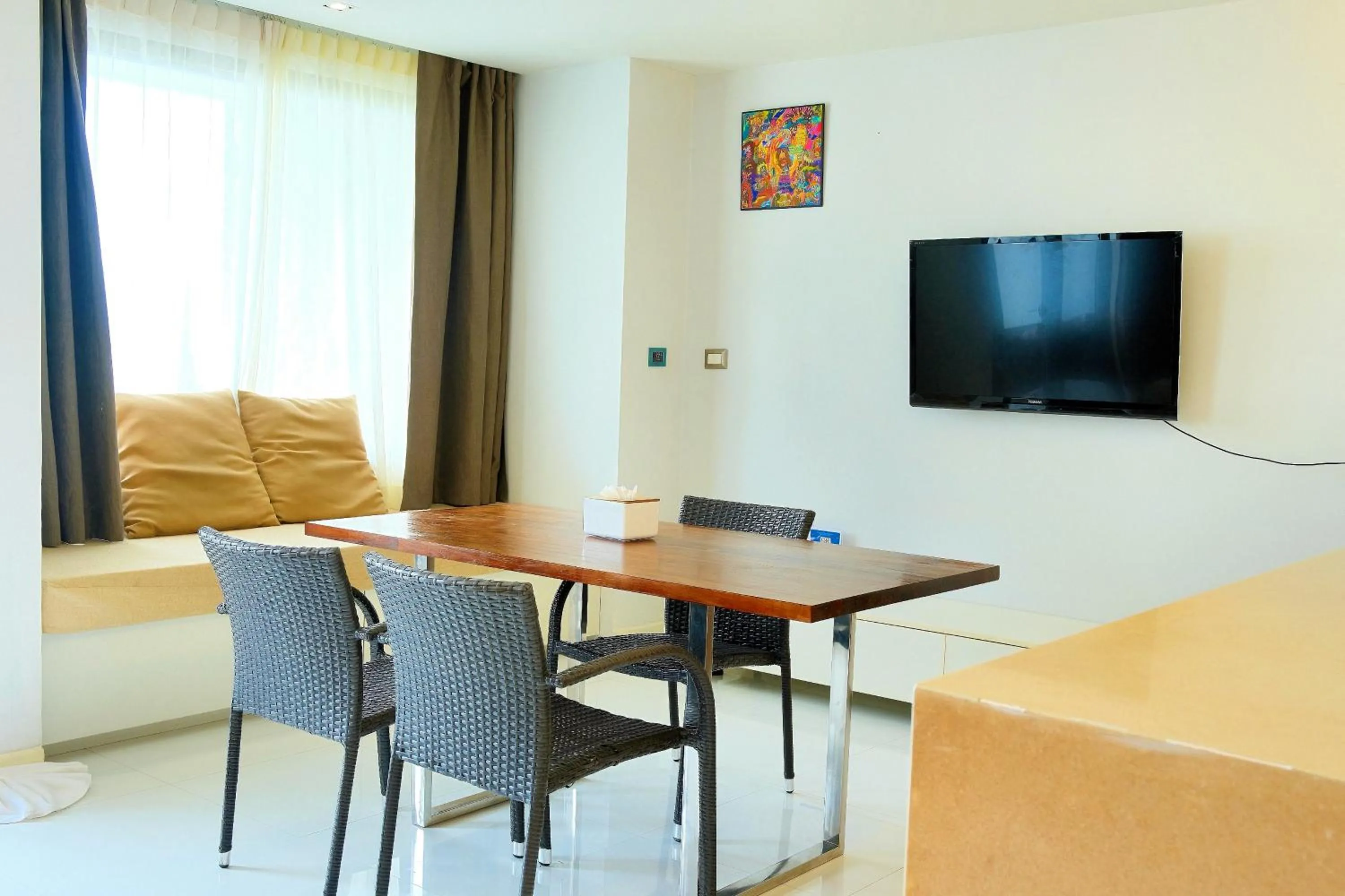 Communal lounge/ TV room in Phuket Moonlit Bay Seaview Resort & Spa