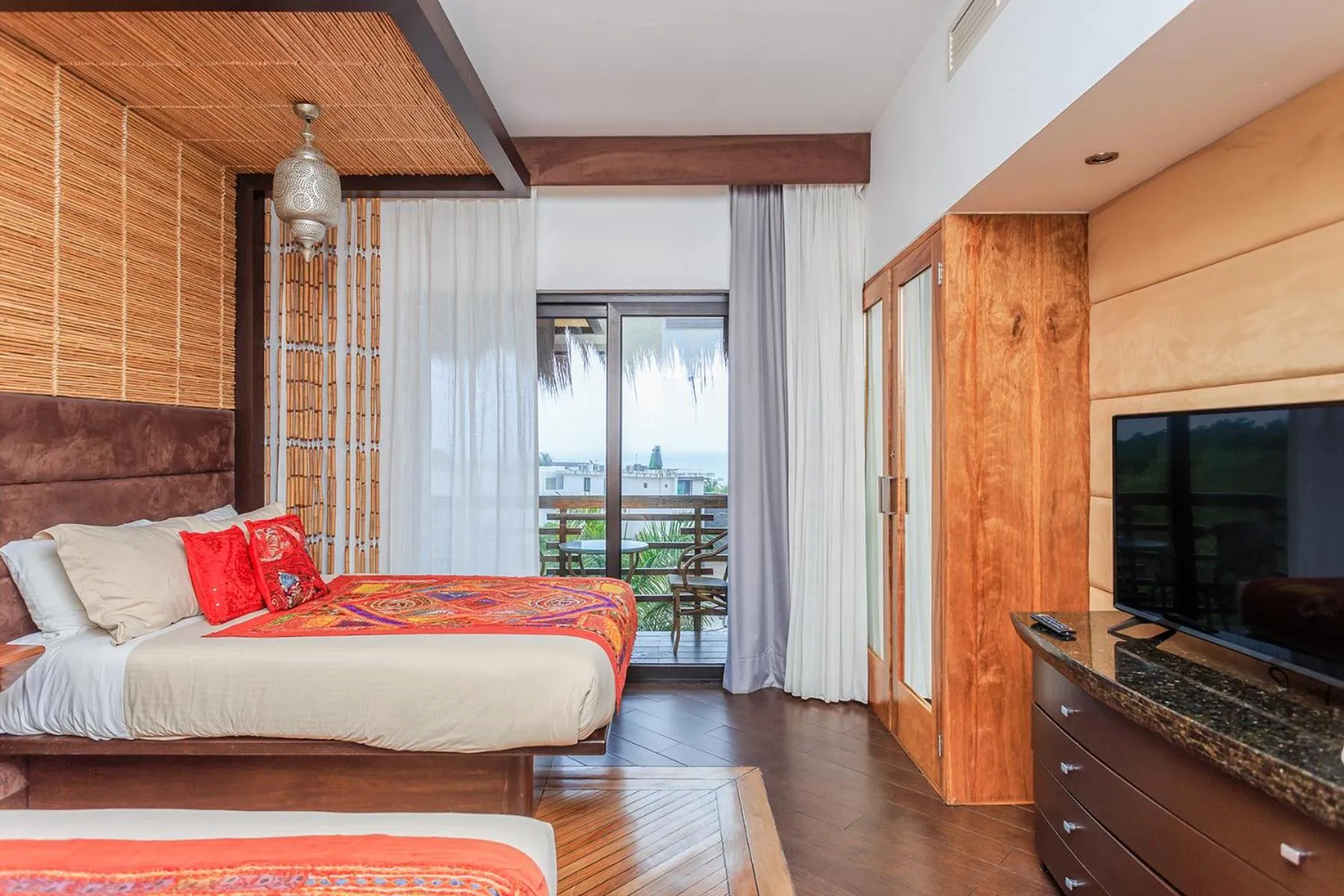 Communal lounge/ TV room, Bed in Aldea Thai by Stella Rentals