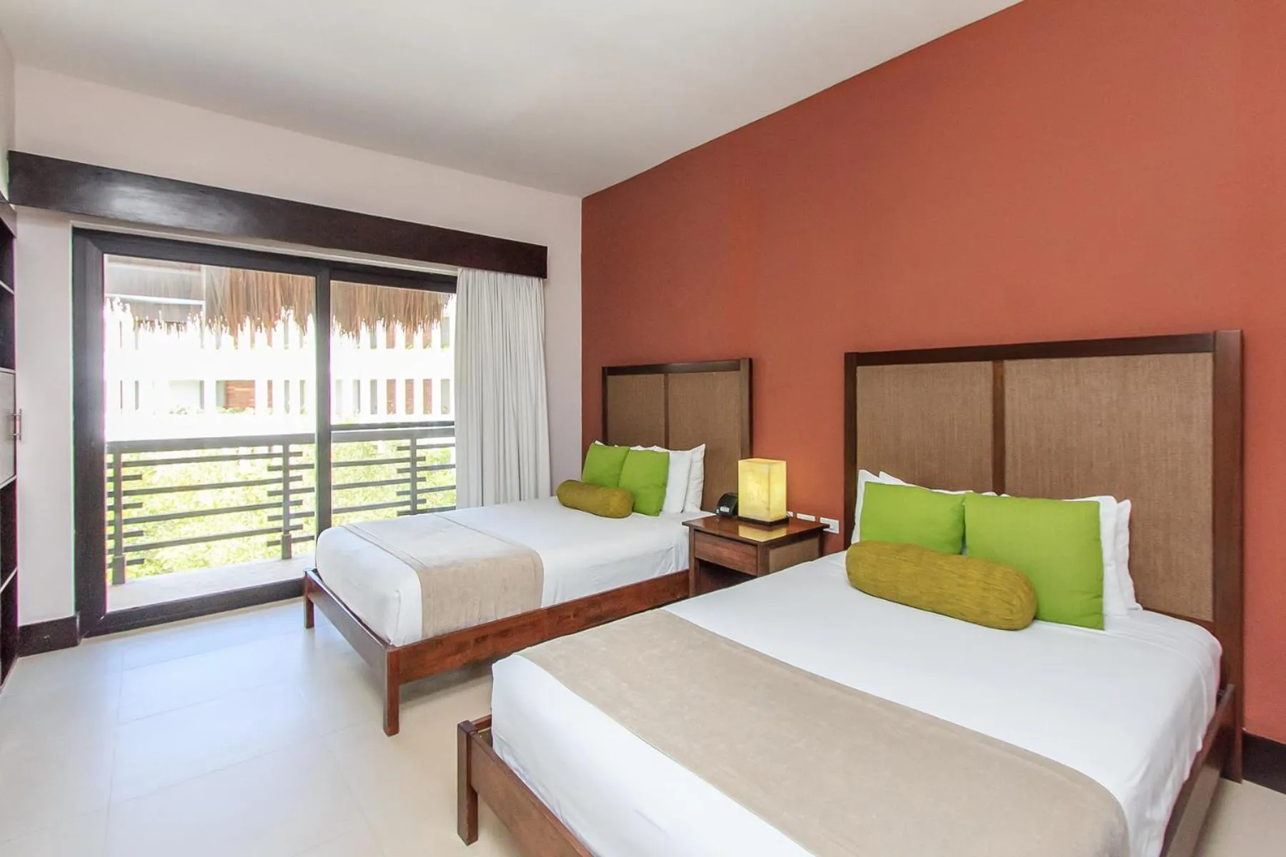 Bed in Aldea Thai by Stella Rentals