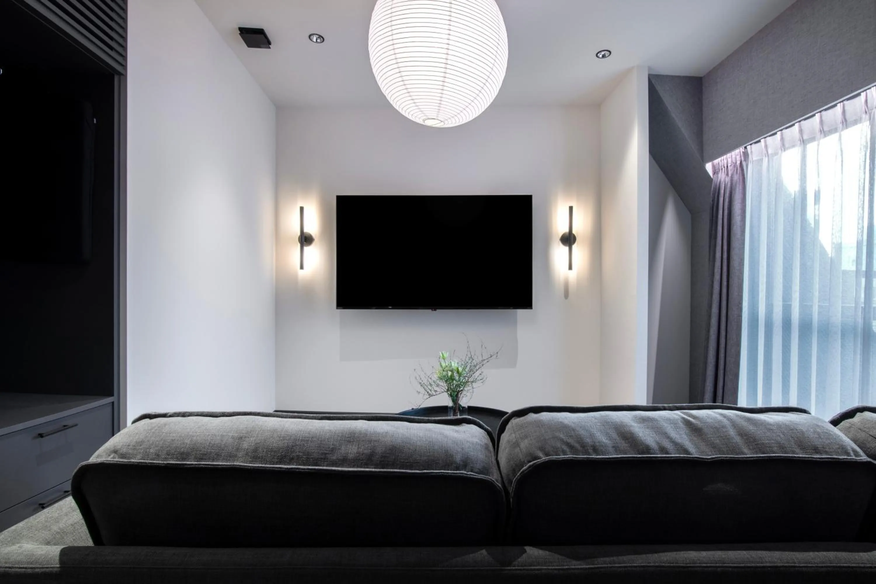 Living room, Bed in Hotel Guild 5