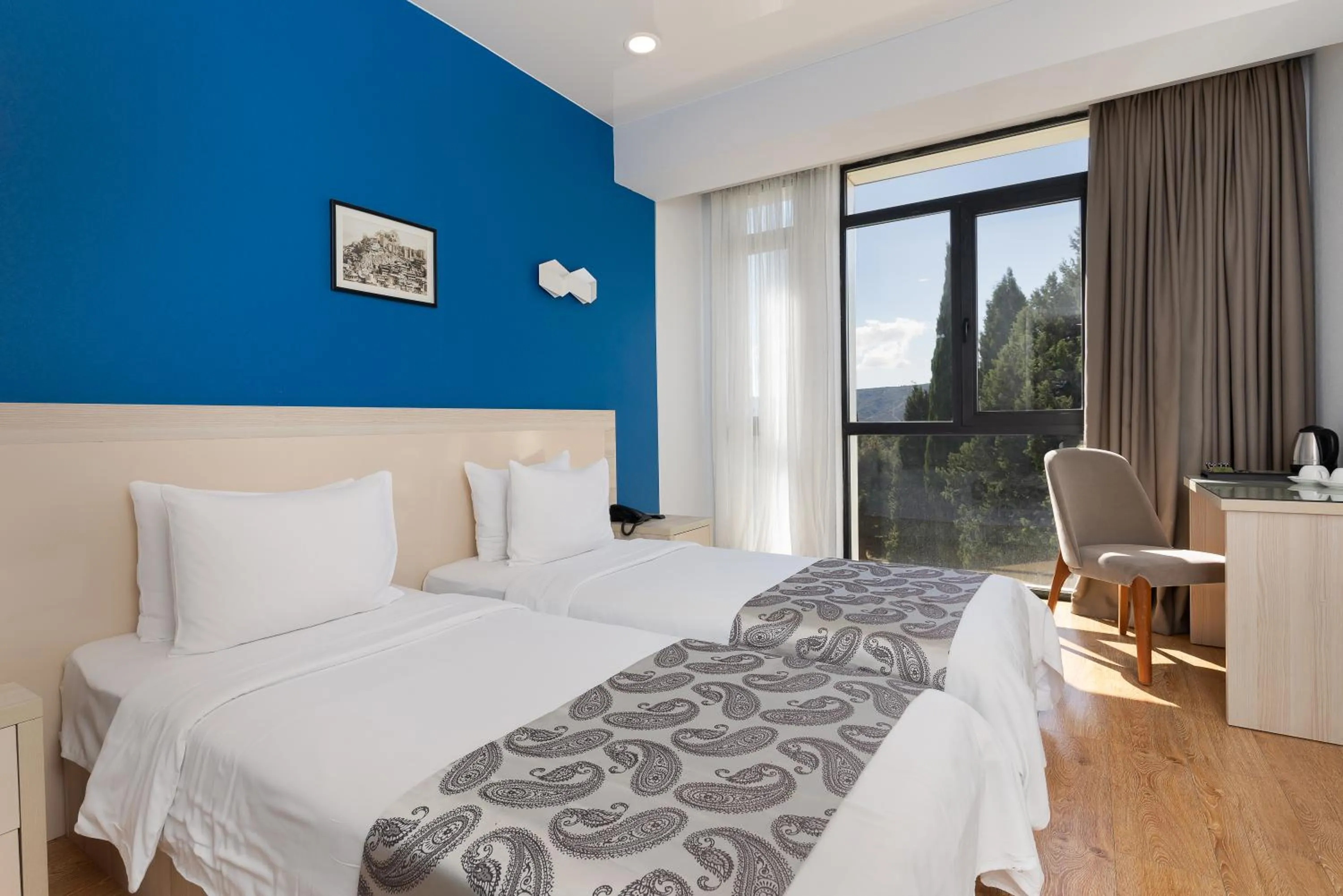 Photo of the whole room, Bed in Iveria Inn Hotel