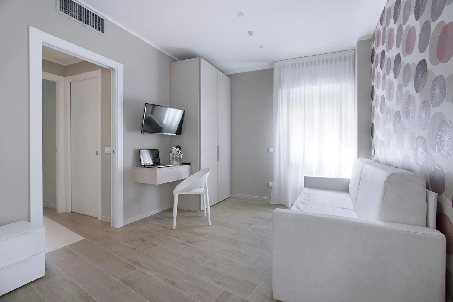 Seating area, Bed in Residence Dolcemare