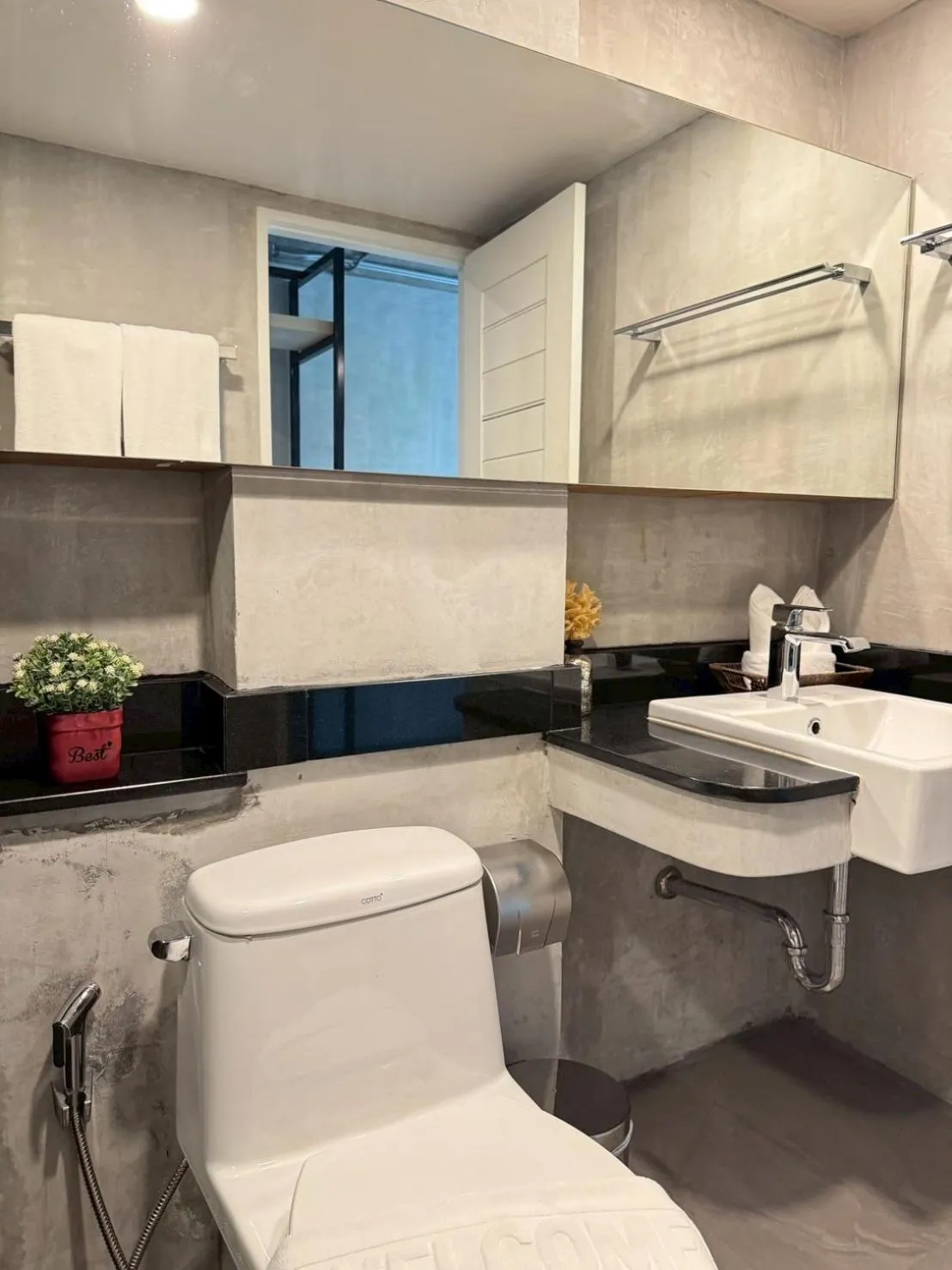 Toilet in Aspira Central Patong