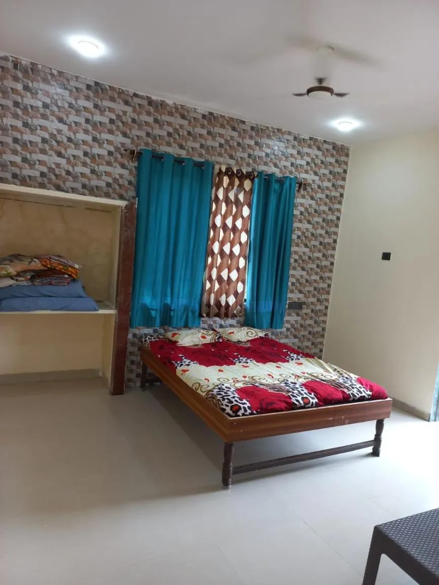 Bed in Tendulkar Beach Resort