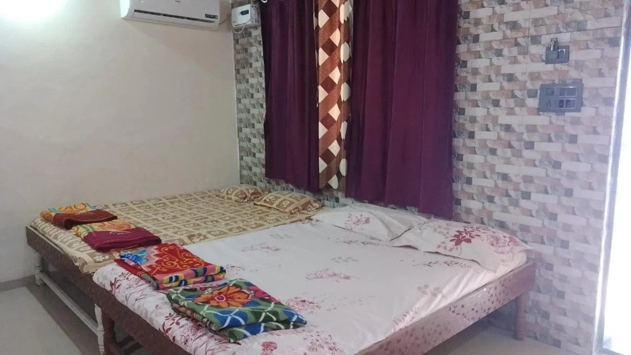 Bed in Tendulkar Beach Resort
