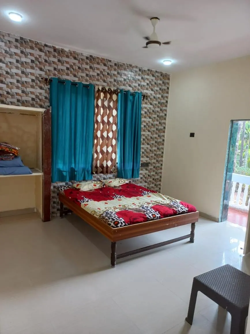 Bed in Tendulkar Beach Resort