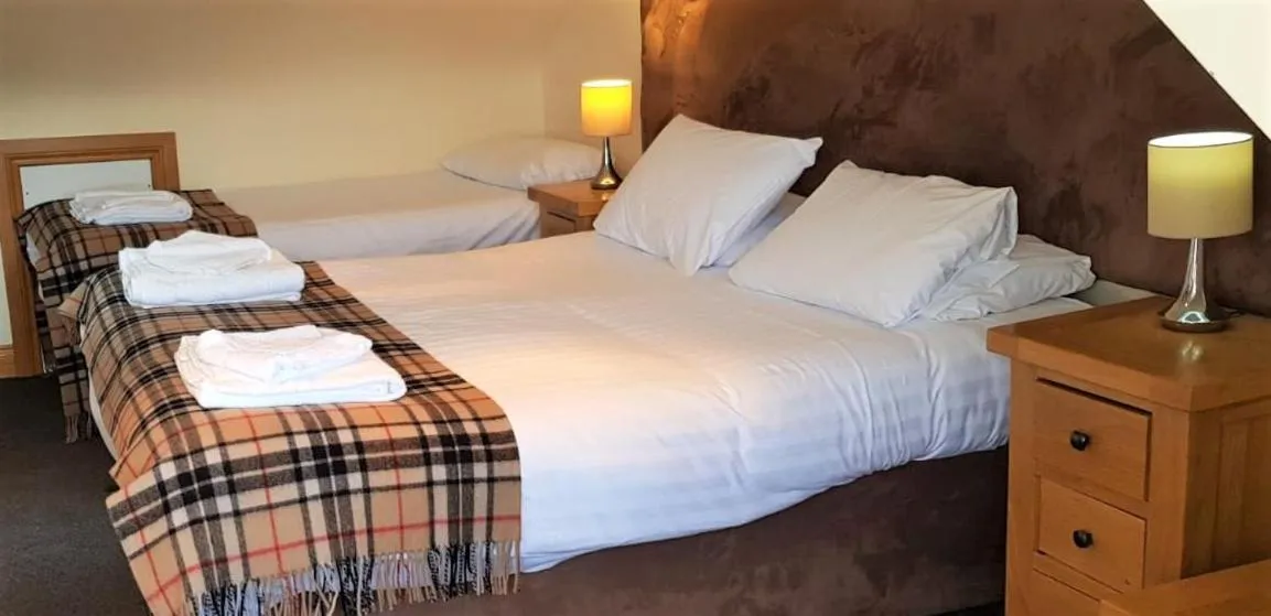 Photo of the whole room, Bed in The Harbour House Sea Front Hotel