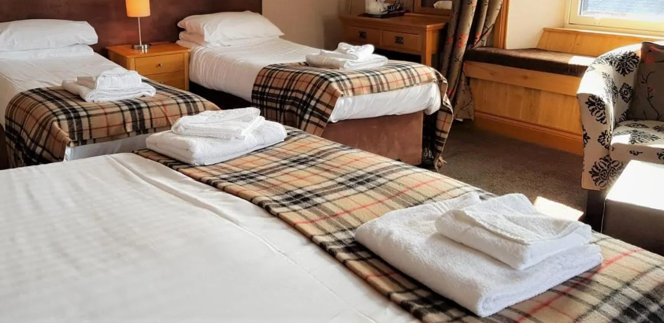 Photo of the whole room, Bed in The Harbour House Sea Front Hotel