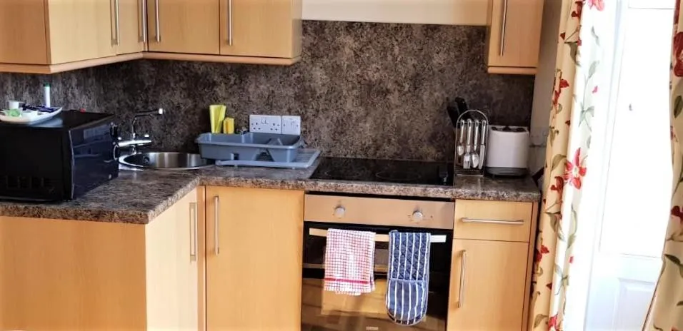 Kitchen or kitchenette in The Harbour House Sea Front Hotel