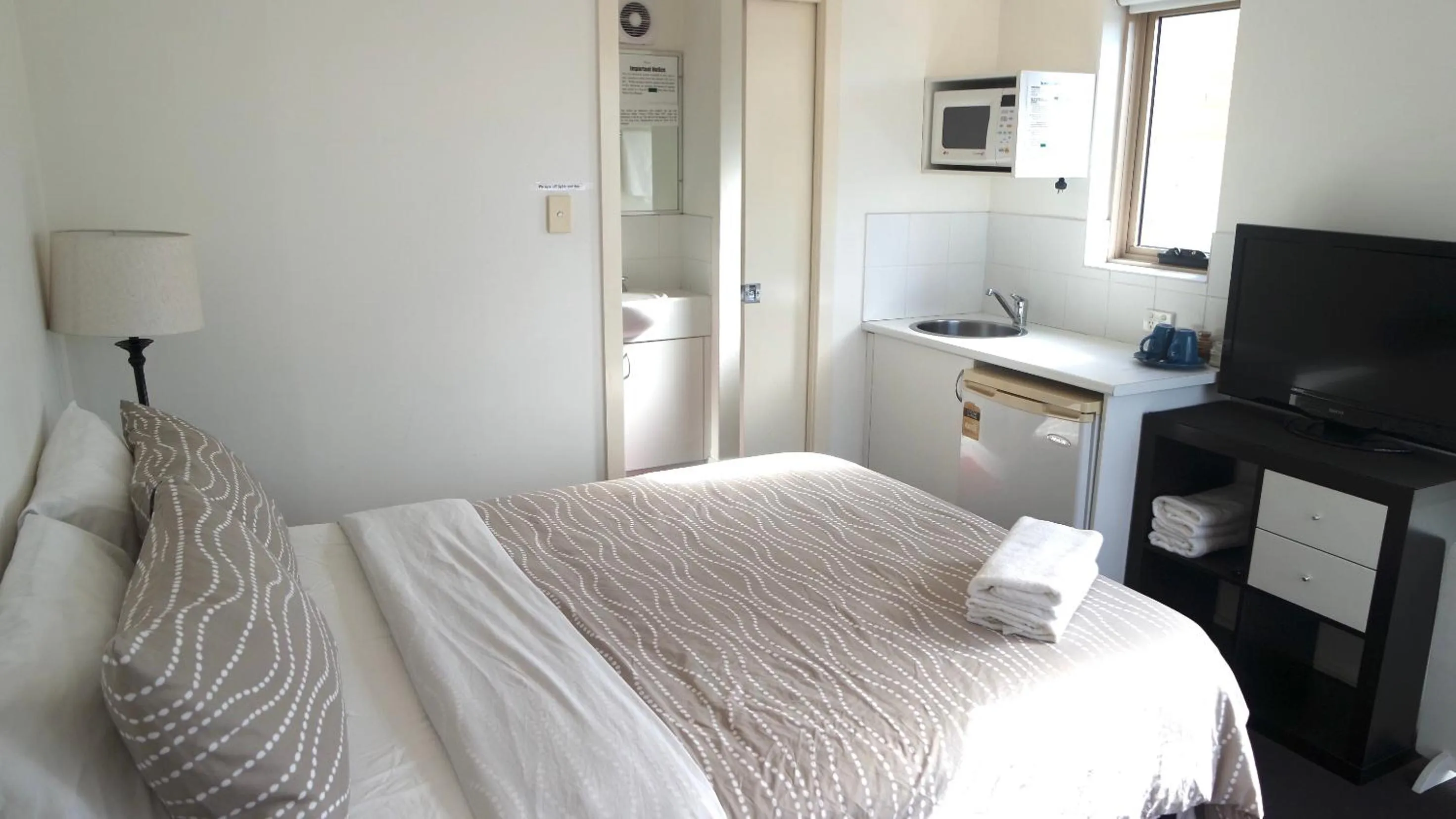 Bed in Cityview Studio Accommodation