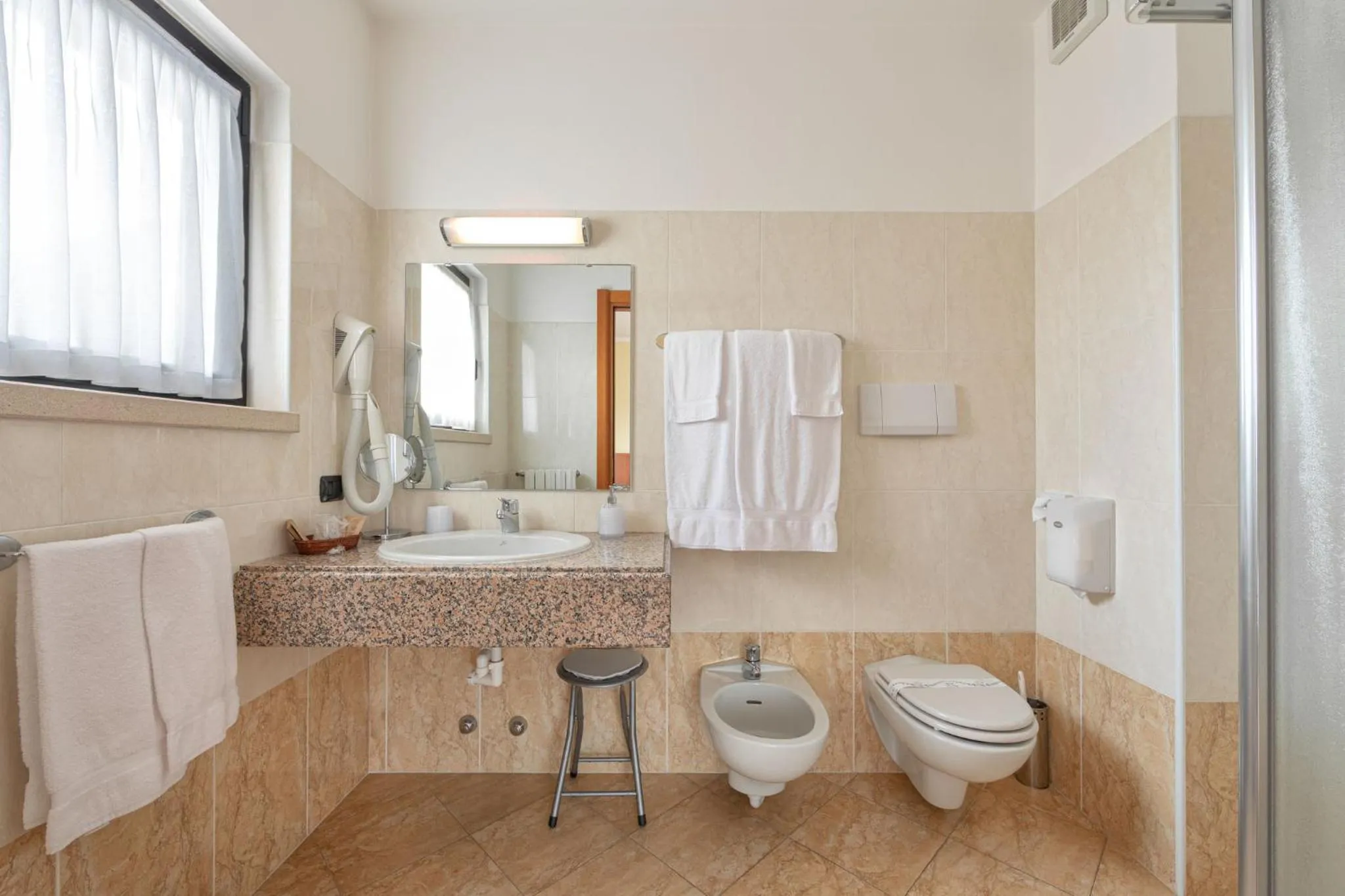 Toilet in Hotel Postumia