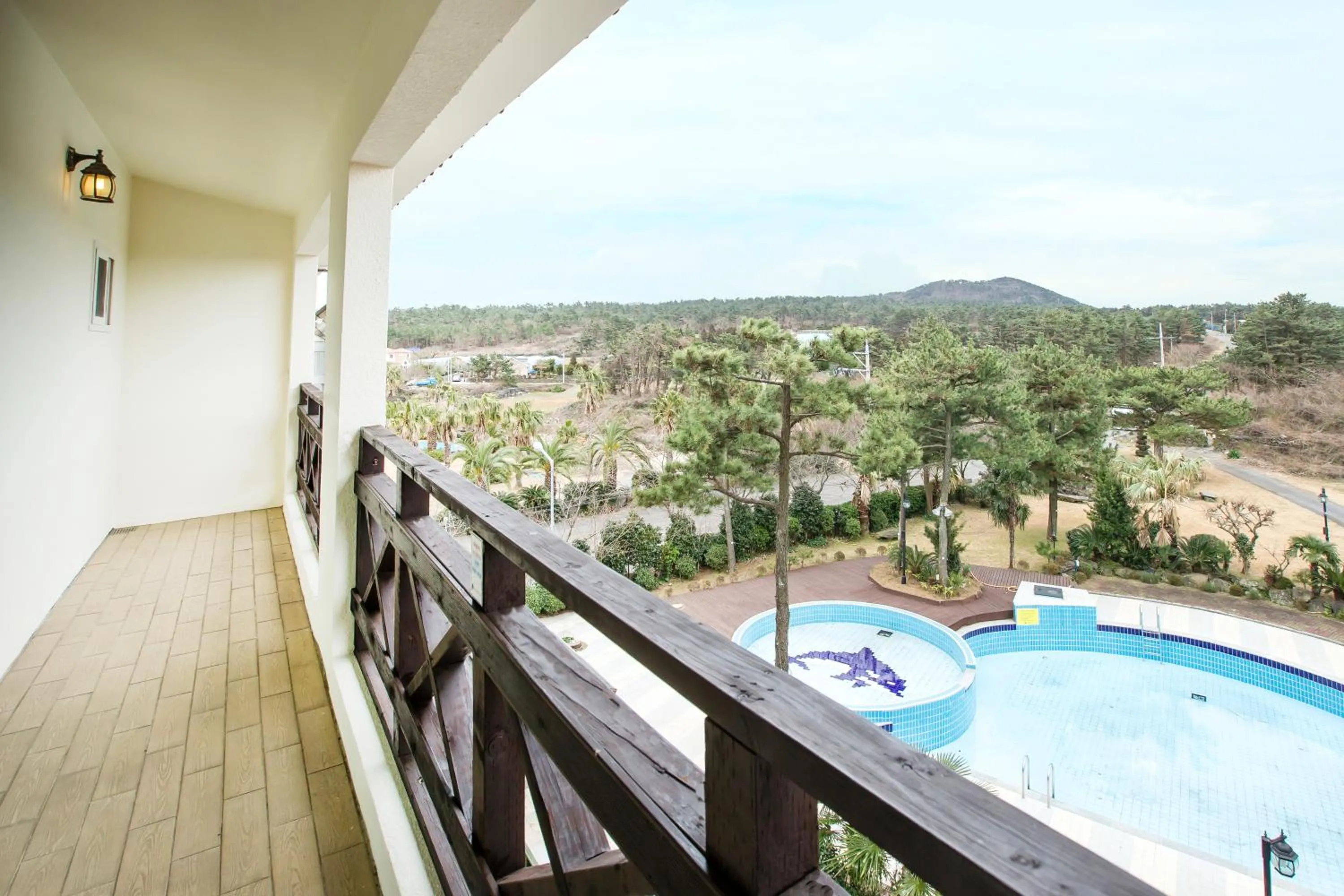 Balcony/Terrace, Pool View in Benikea  The Jeju Resort