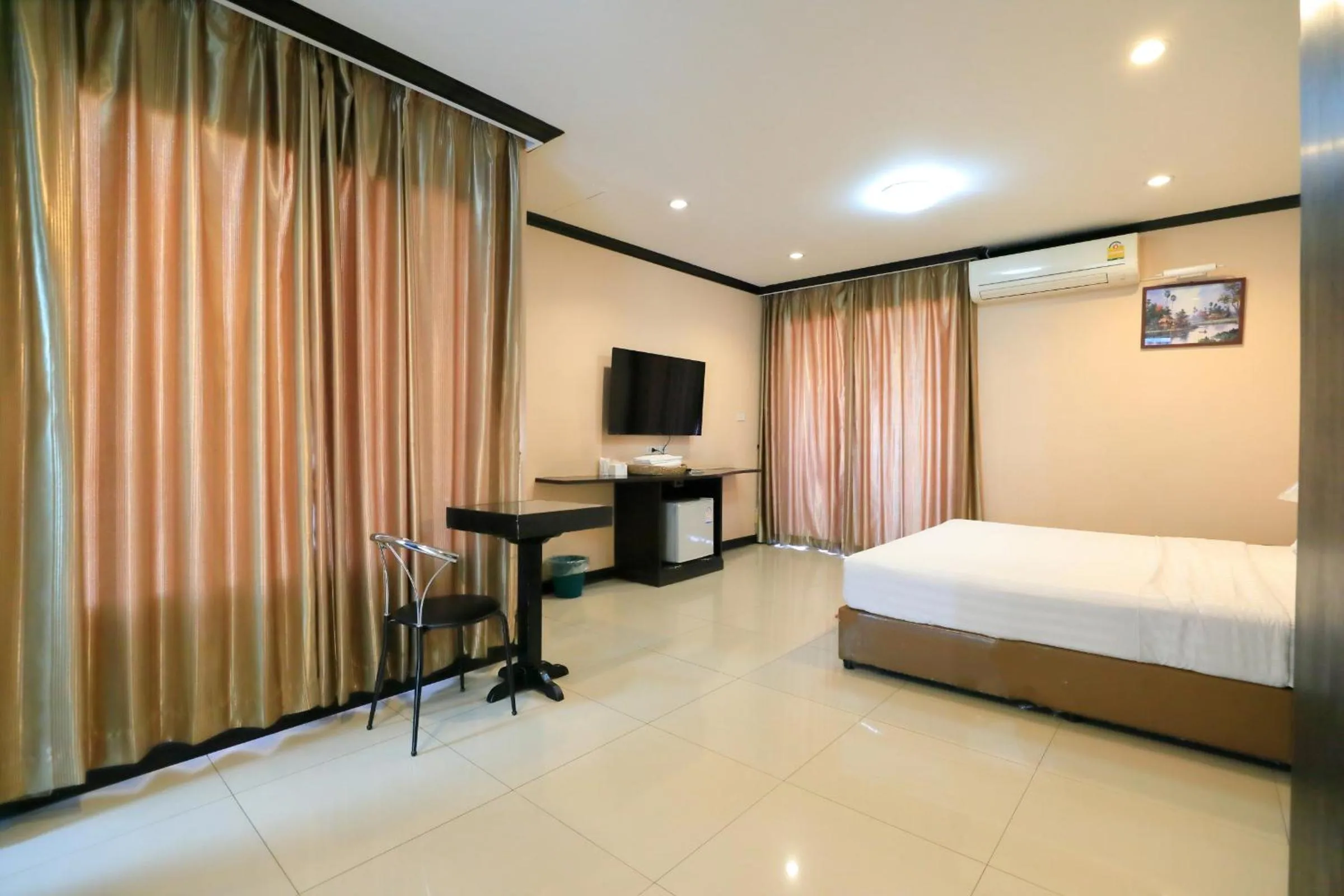 Bed in Triton Hotel Nakhonratchasima โรงแรมไททัน