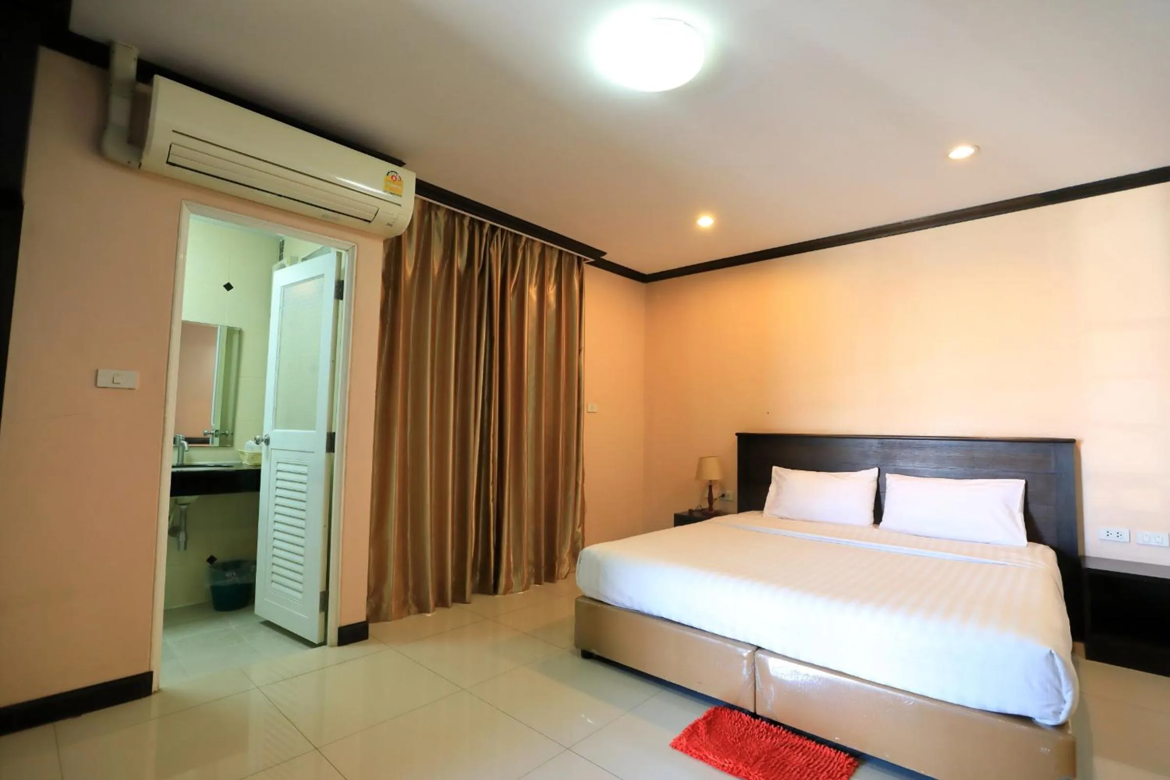 Bed in Triton Hotel Nakhonratchasima โรงแรมไททัน