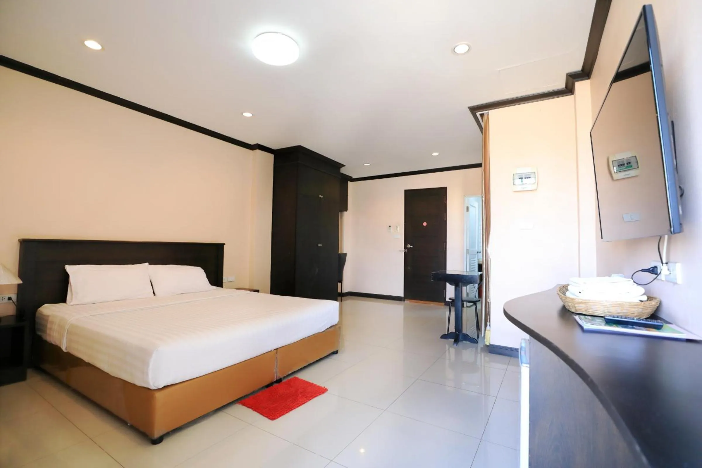 Bed in Triton Hotel Nakhonratchasima โรงแรมไททัน
