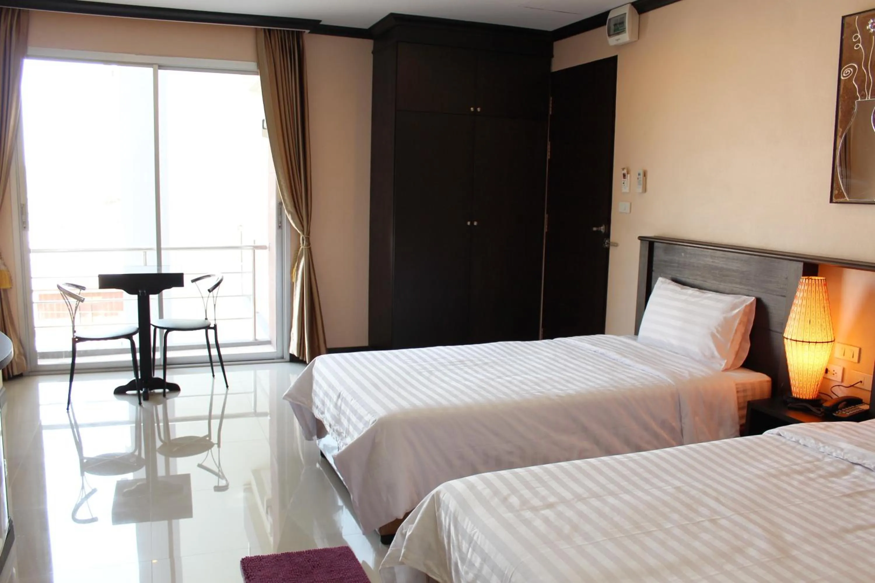 Photo of the whole room, Bed in Triton Place